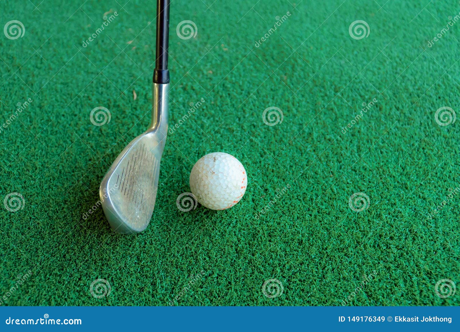 Golf Swing and a Golf Ball in the Green Background or the Astroturf Stock Image Image of