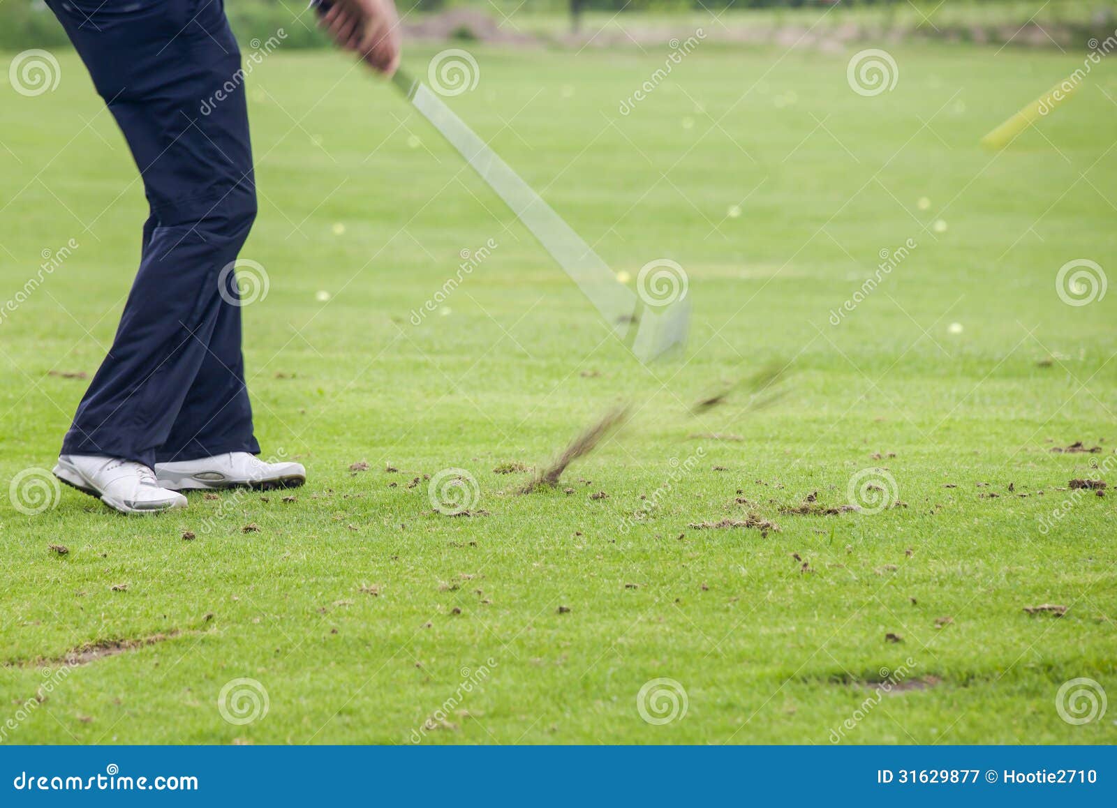 Golfer hits ball impact stock image. Image of putter 31629877