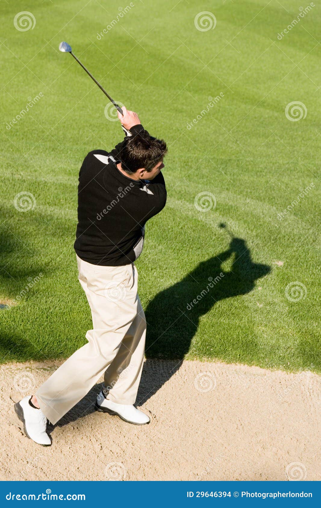 Golfer Hitting Golf Ball Out of a Sand Trap Stock Photo Image of