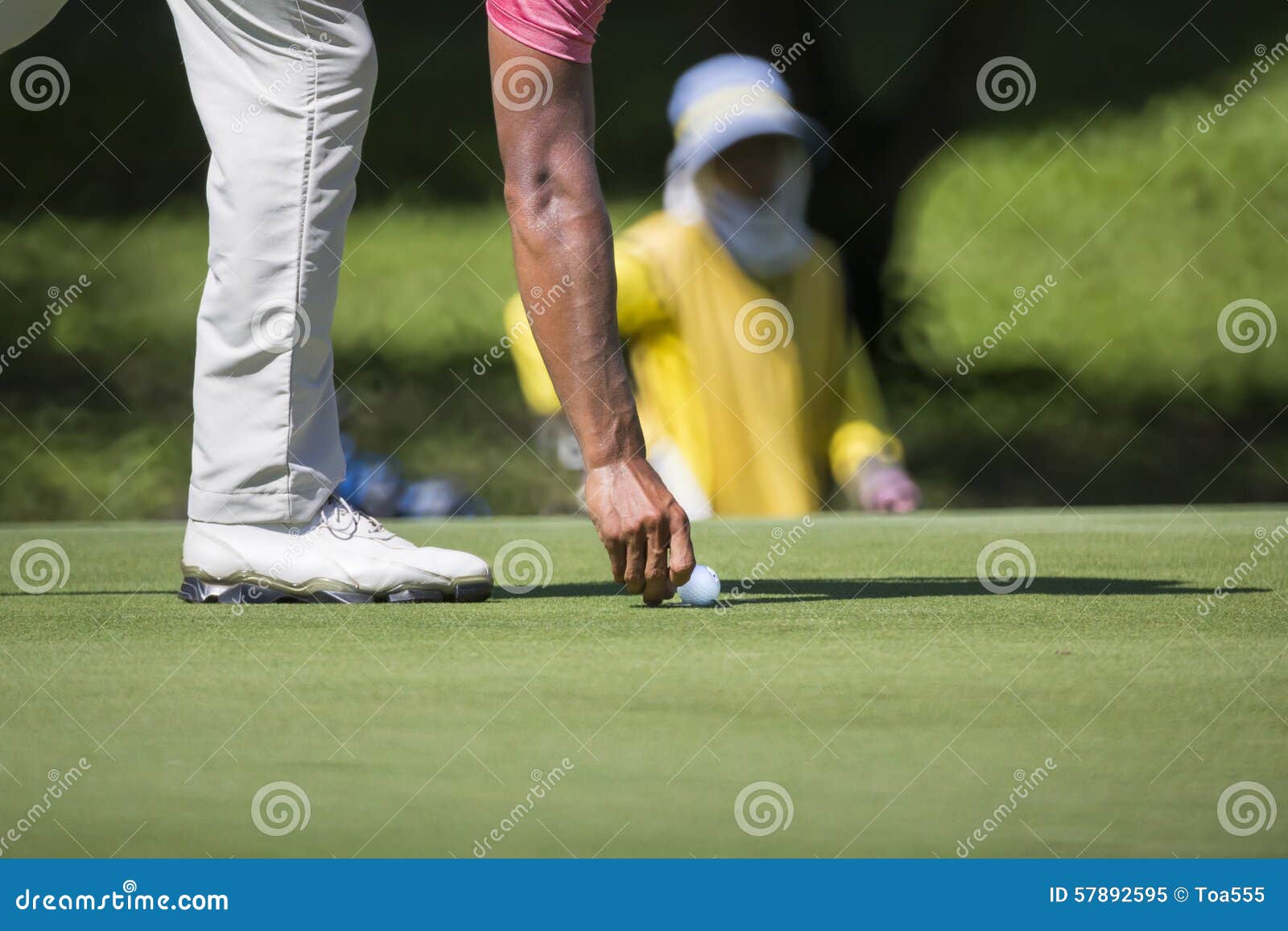 Golfer Marks His Ball Position on a Green Stock Image Image of play