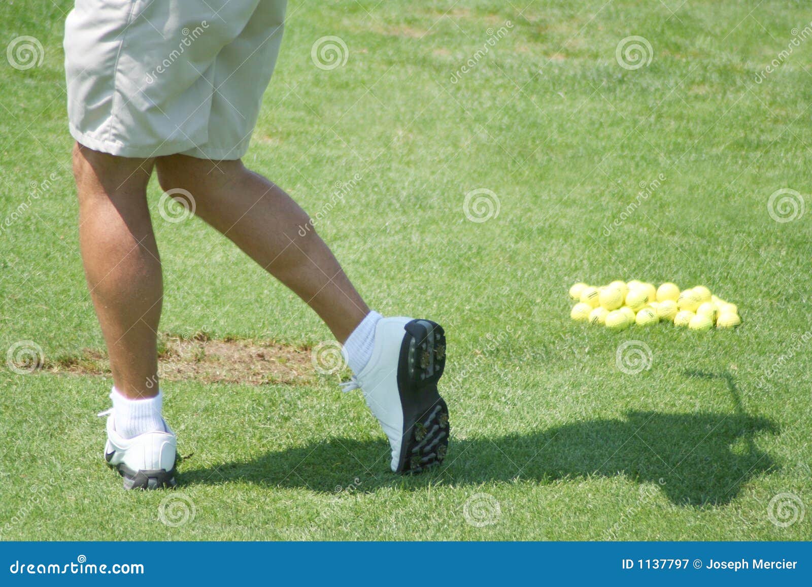 Golfer Practicing Drive stock image. Image of balls, range 1137797