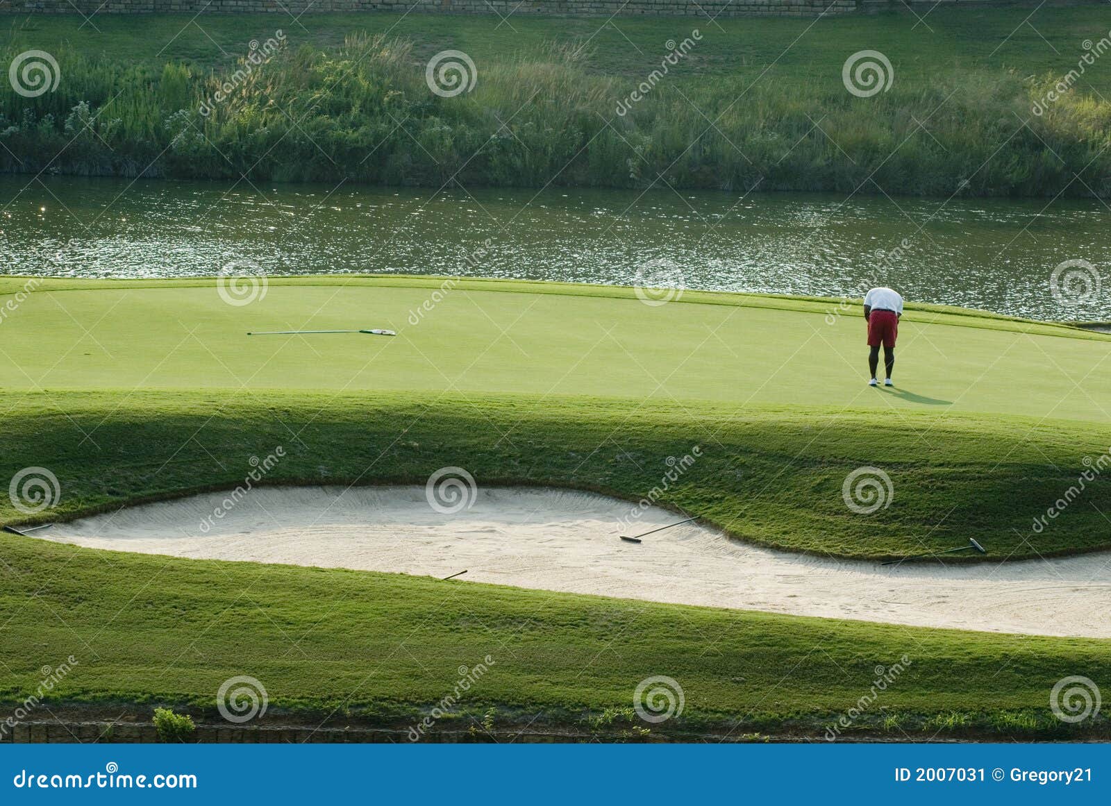 Golfer on Putting Green stock image. Image of strokes 2007031