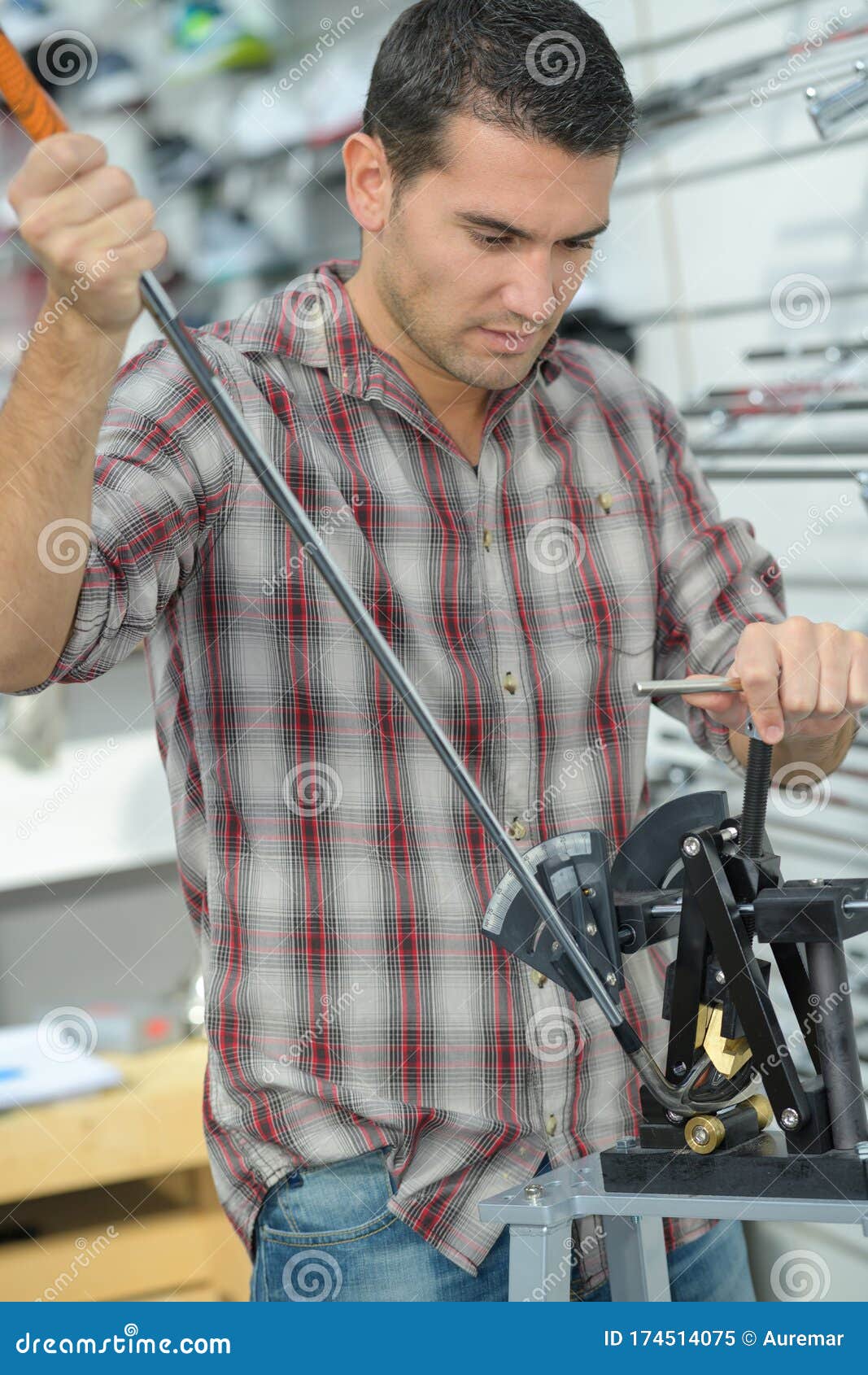 Golfer repairing club stock image. Image of customer 174514075