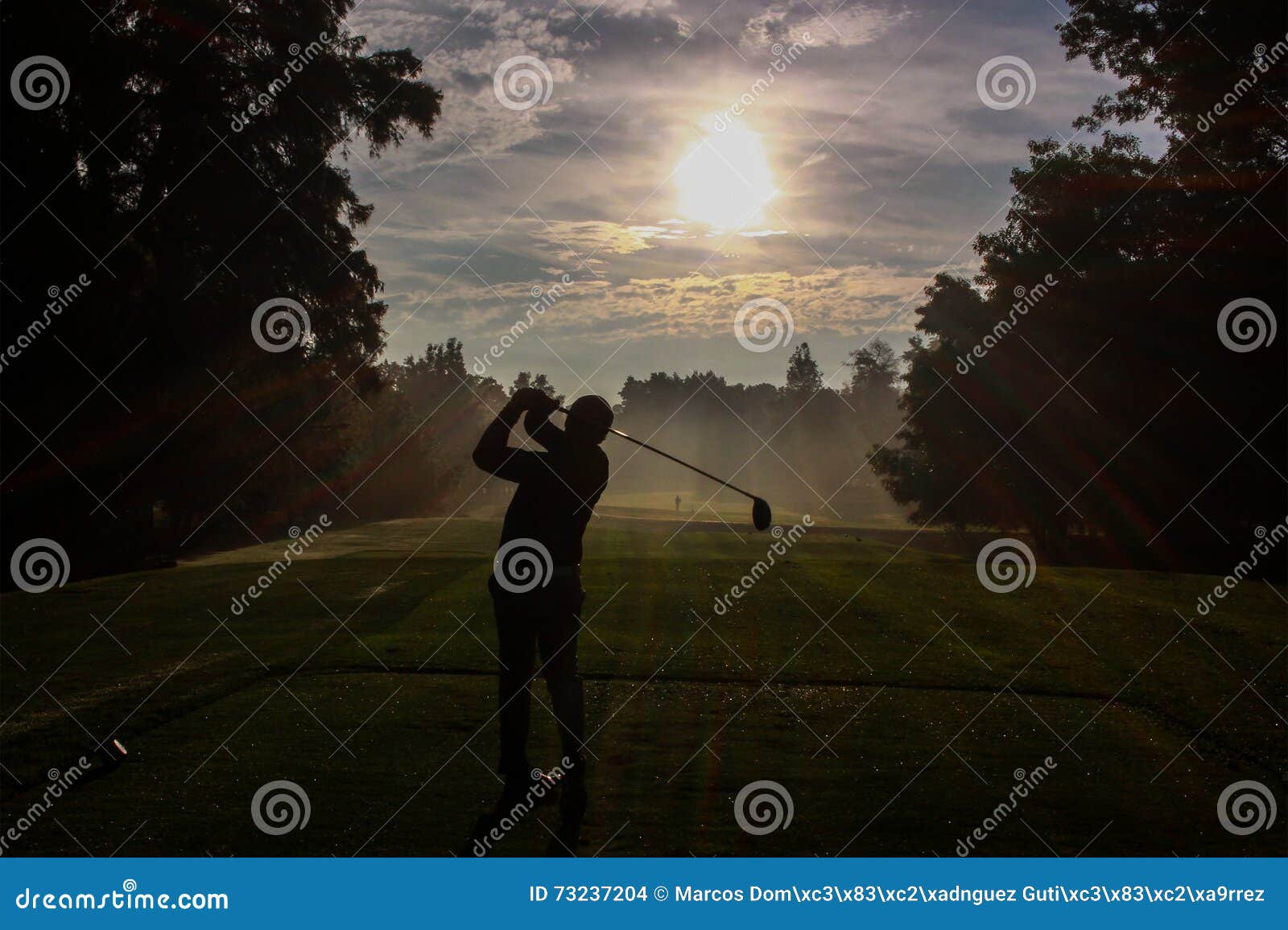 golfer silhouette at dawn