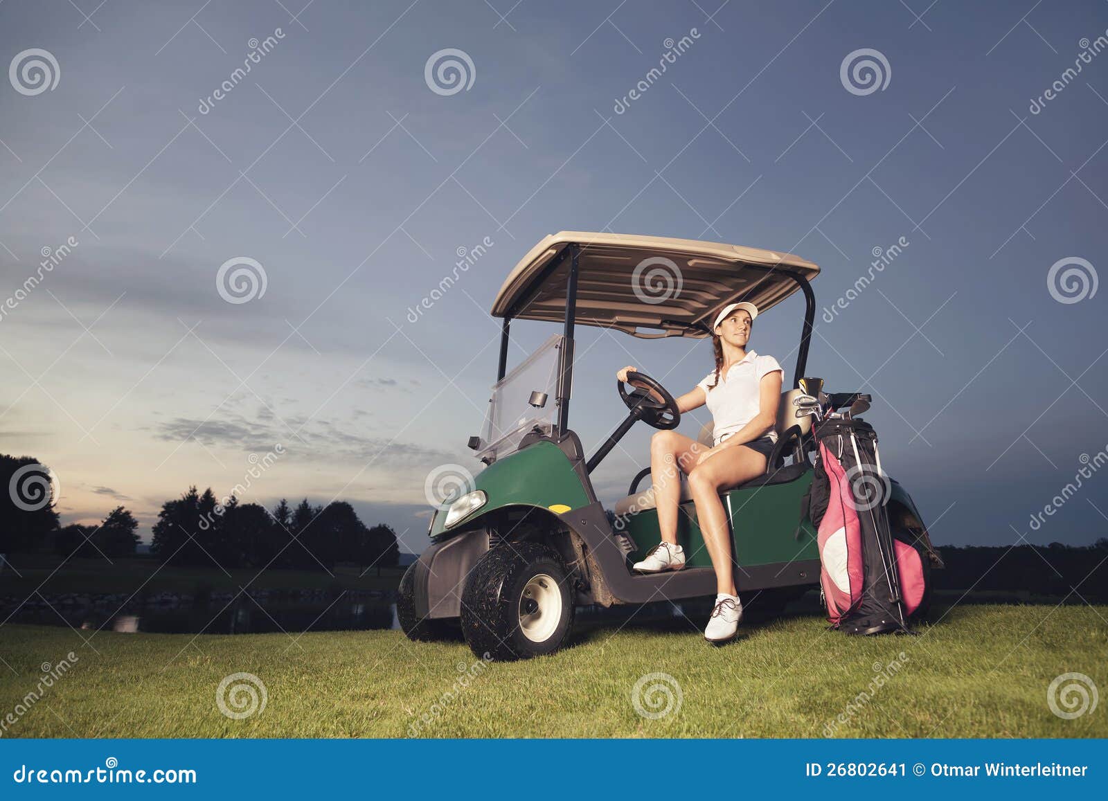 Golfer Sitting in Golf Cart at Twilight. Stock Image Image of person