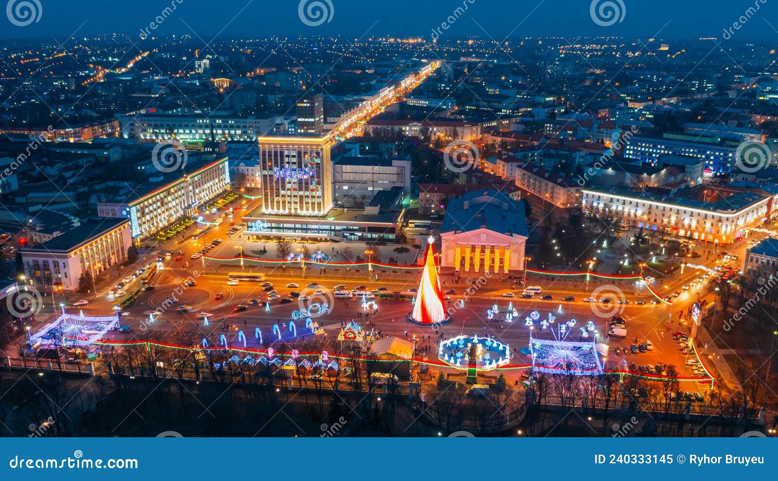 gomel, belarus. main christmas tree and festive illumination on lenin square in homel. new year celebration in belarus