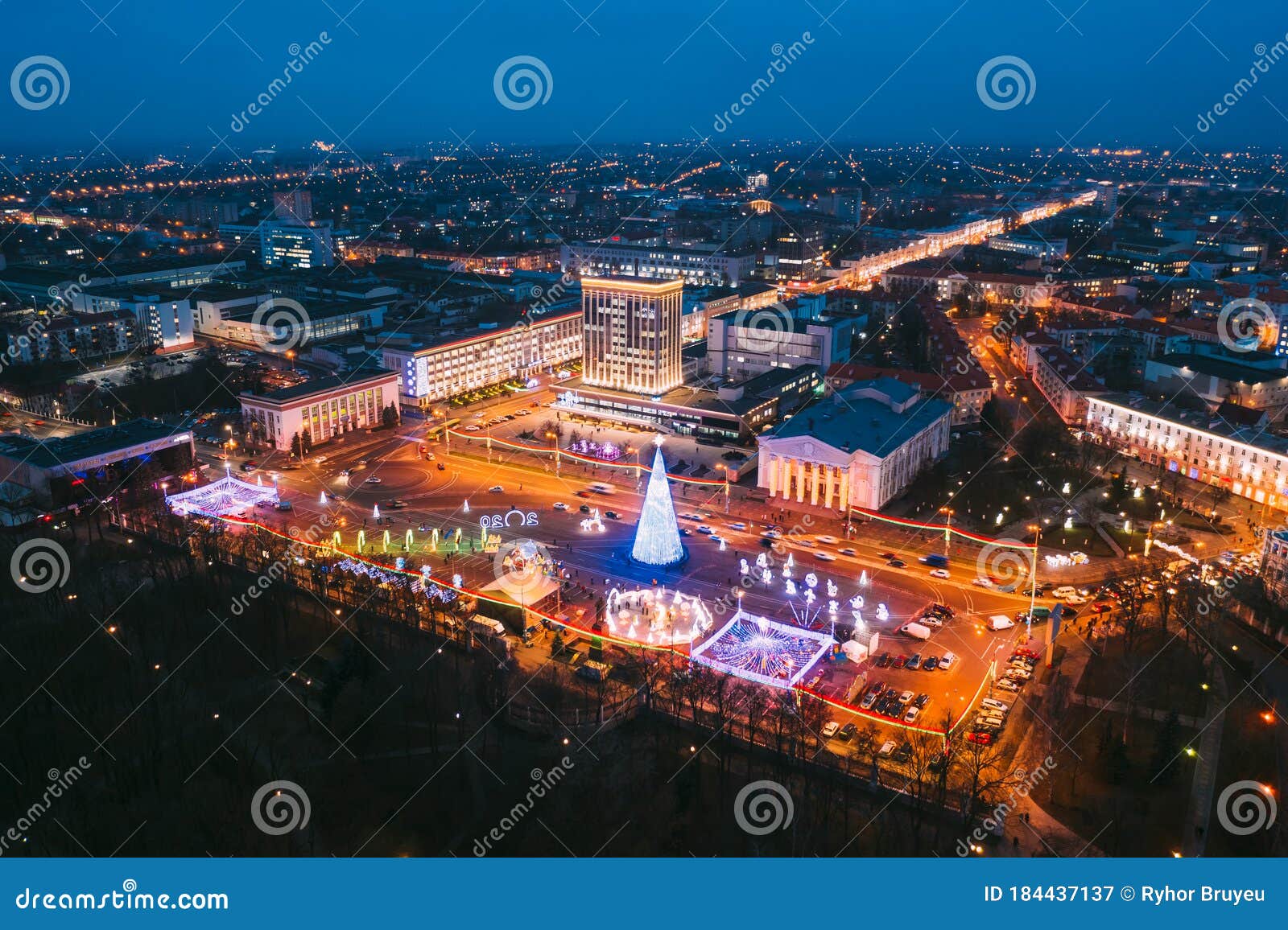 gomel, belarus. main christmas tree and festive illumination on lenin square in homel. new year in belarus. aerial night