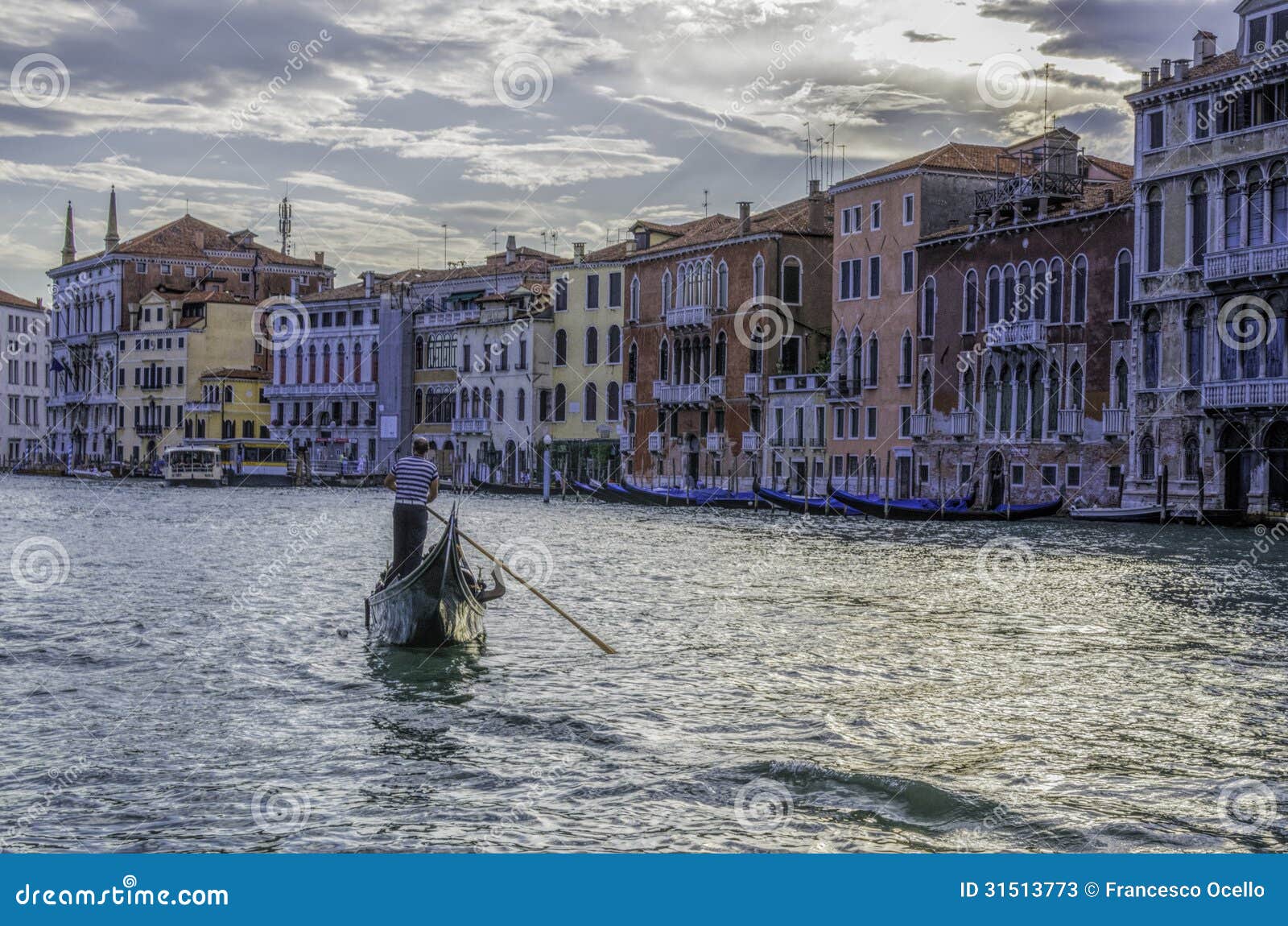 gondola and gondolier on the grand canal, venice