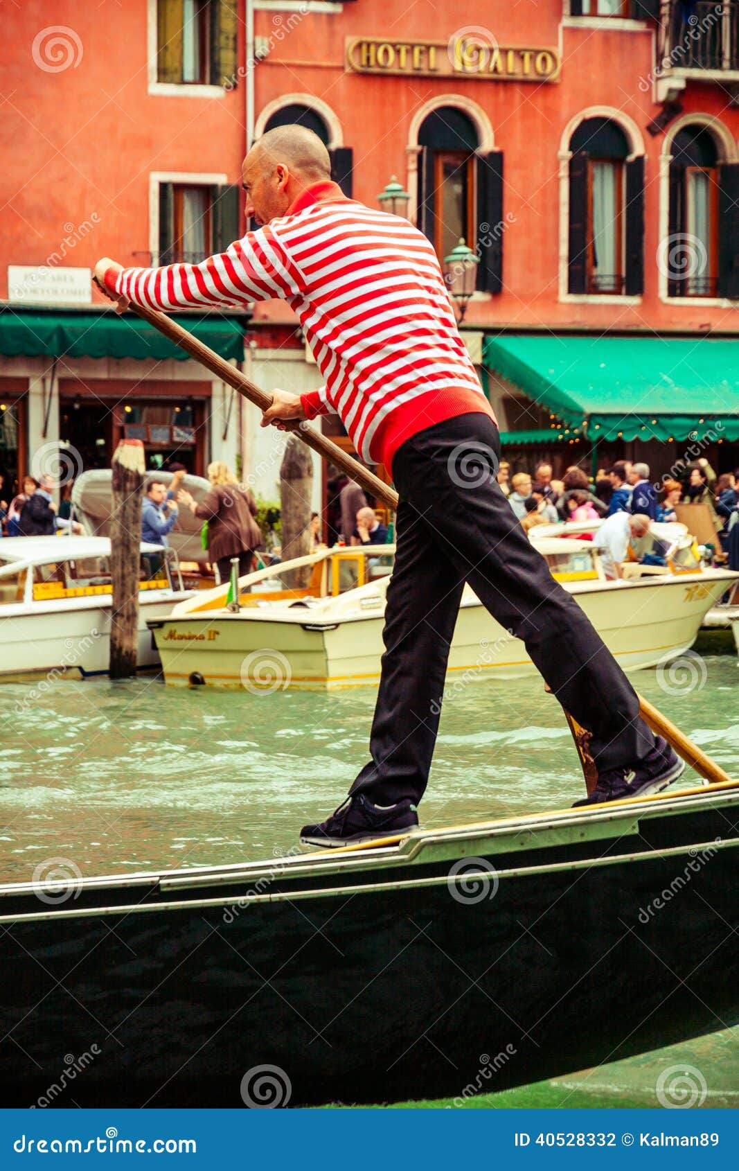 Gondolier in Venice editorial photography. Image of ...