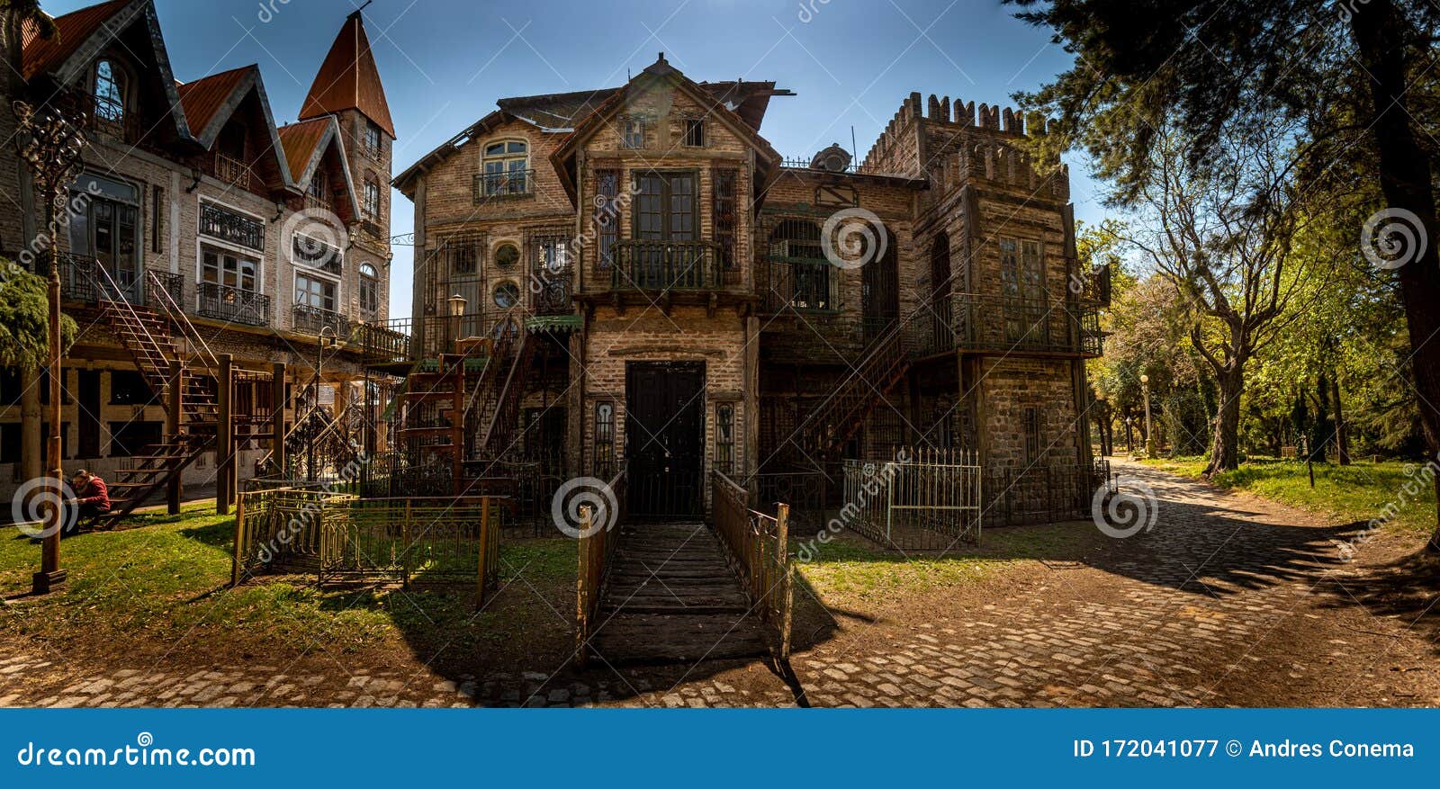 gonzalez catan, argentina, september 28, 2019: panoramic view of cobblestone path through abandoned buildings in the amazing