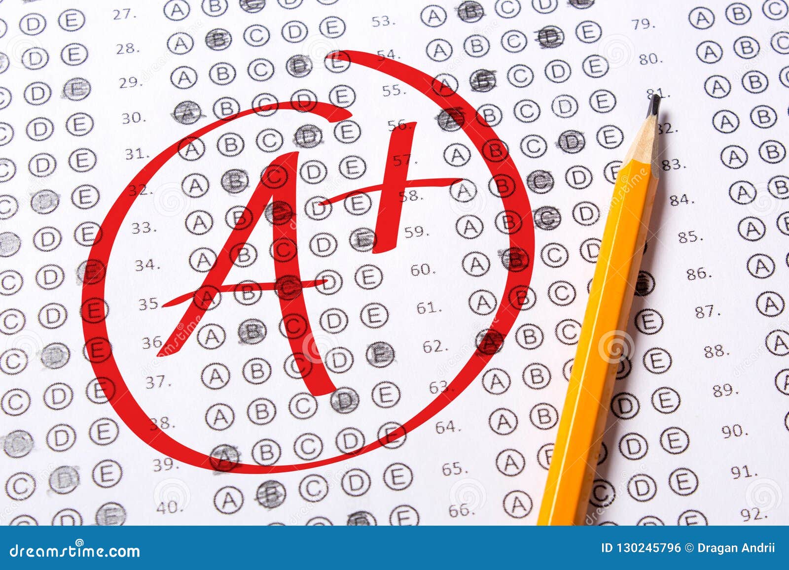 Good Grade Of A Plus Is Written With Red Pen On The Tests Stock Photo