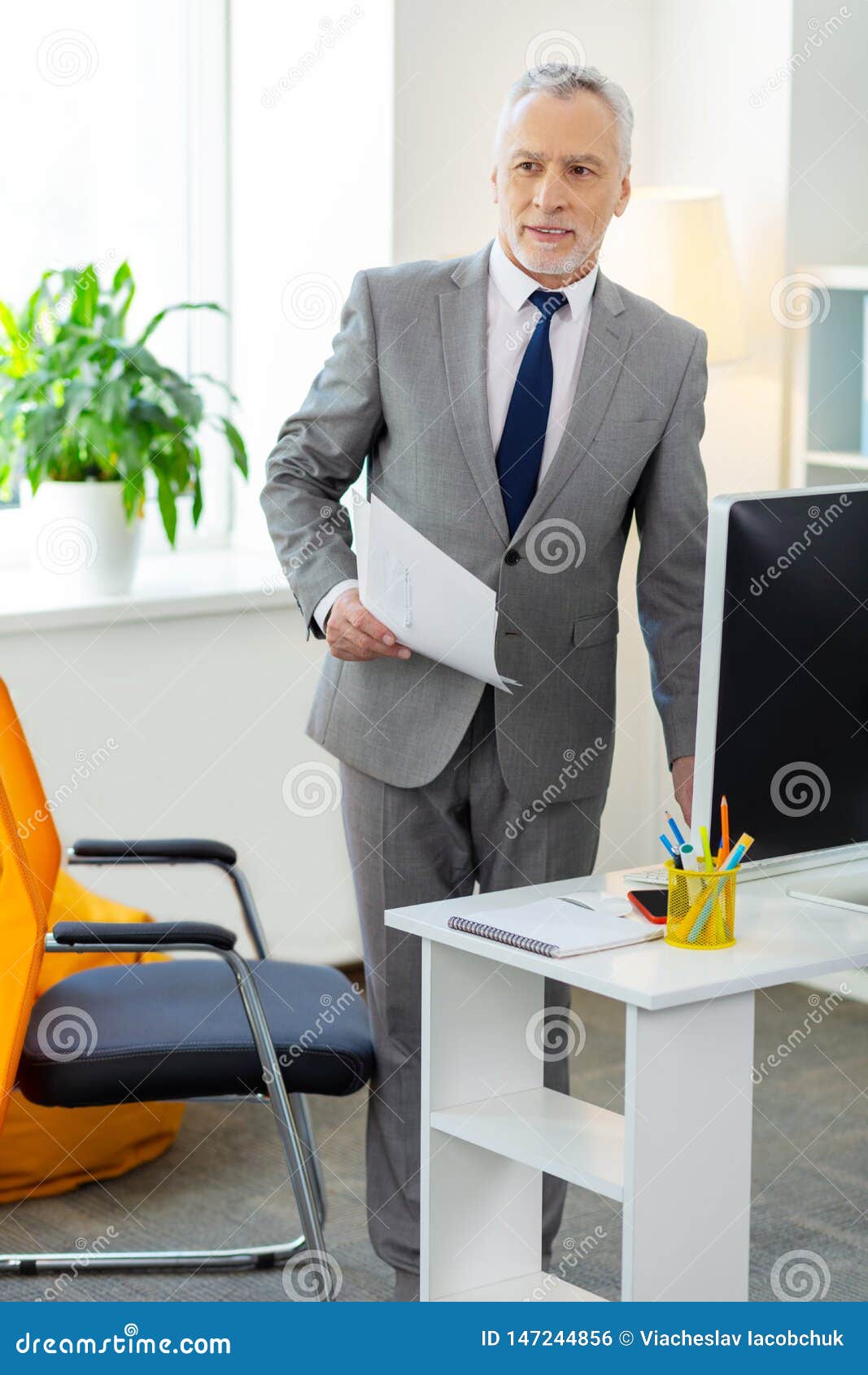 Goodlooking Bearded Office Worker Being Busy at Work Stock Photo