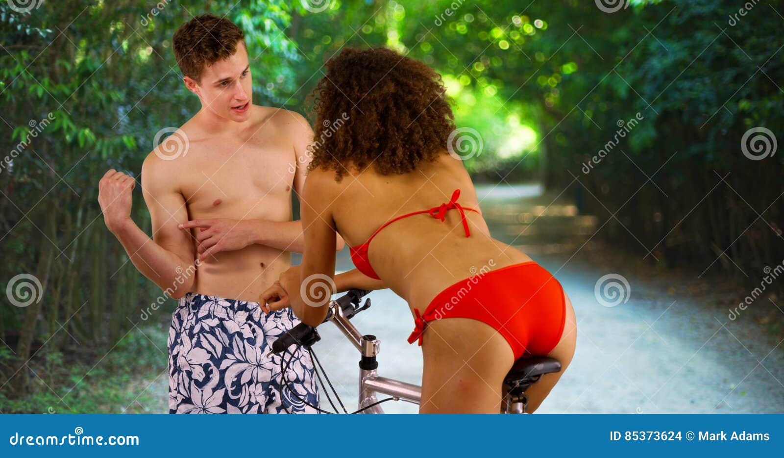 Infect Operate Systematically Good Looking Caucasian Male Showing Off Muscles To Cute Bikini Girl. Stock  Photo - Image of caribbean, outdoor: 85373624