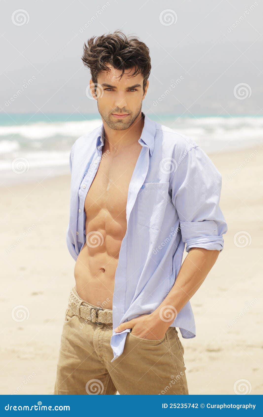 Good Looking, Naked Man Lying On A Bed Of Green Leaves Royalty-Free