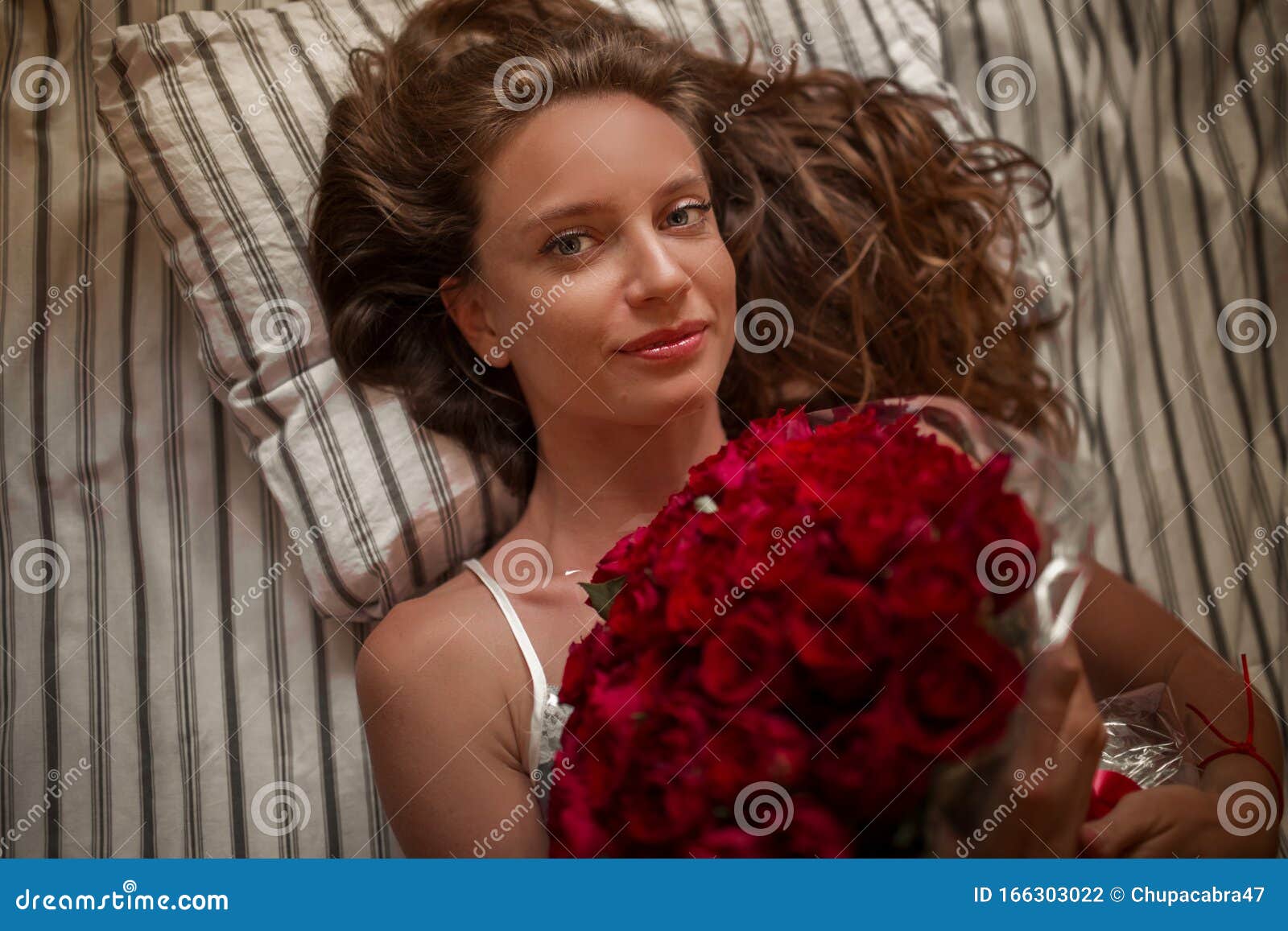 Good Morning Attractive Young Woman in Bed is Holding Bouquet of ...