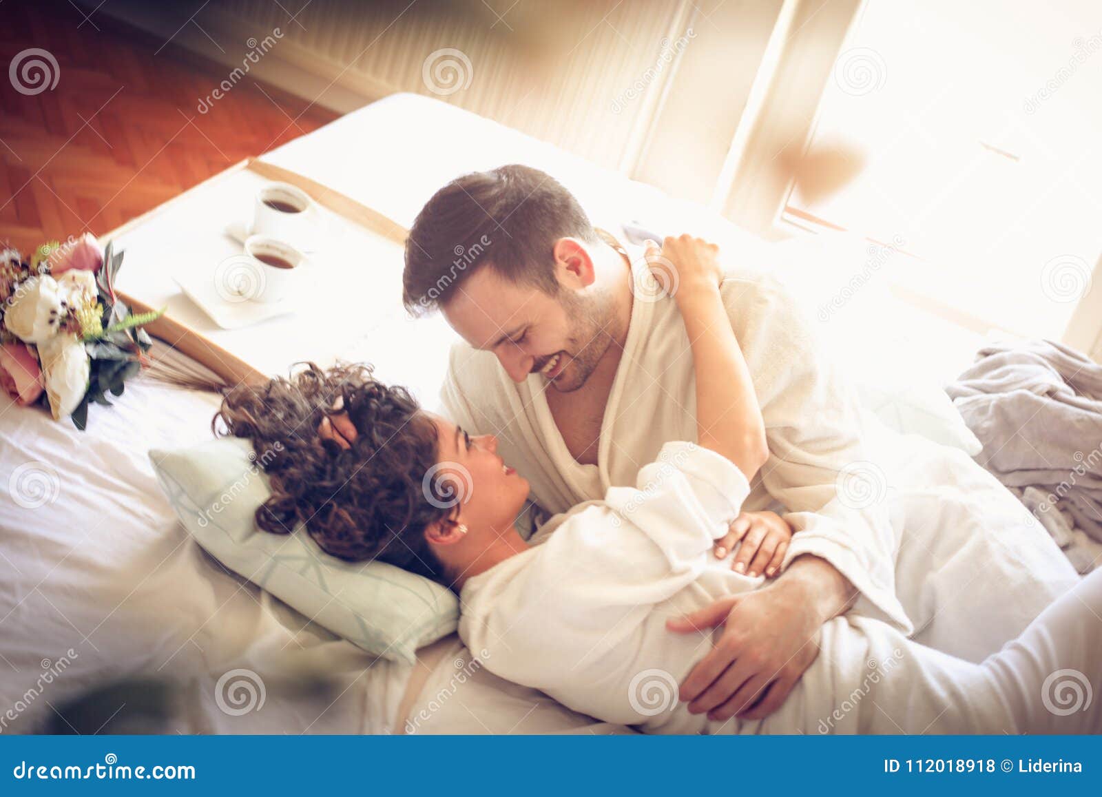 Good Morning. Happy Couple in Bed. Stock Photo - Image of hands ...