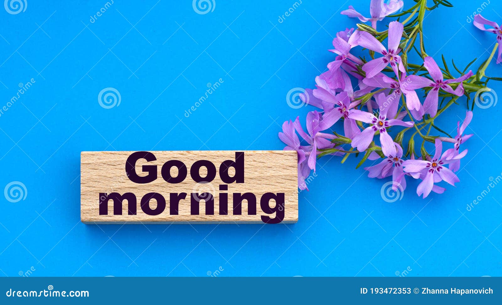 GOOD MORNING Words on a Wooden Block on a Blue Background with ...