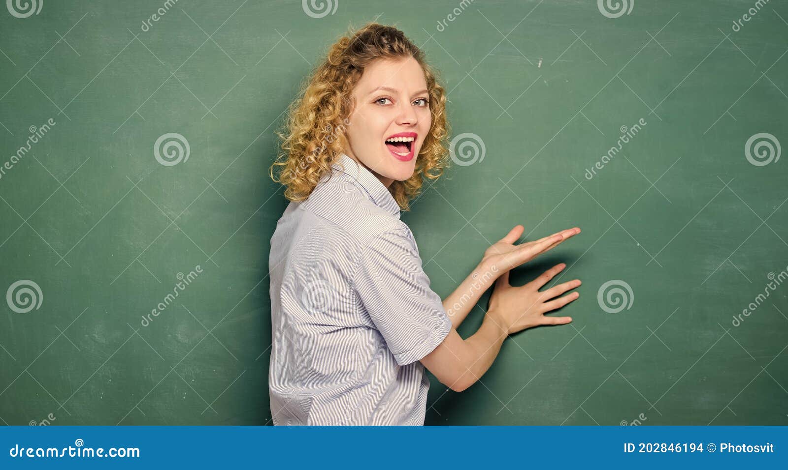 Good Teacher Enjoys Teaching Teacher Drawing At Classroom In School 