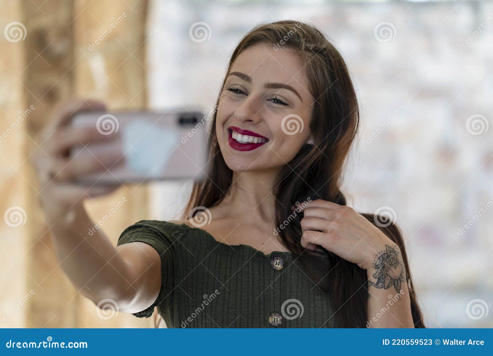 A Lovely Brunette Model Enjoys An Spring Day Outdoors Stock Image