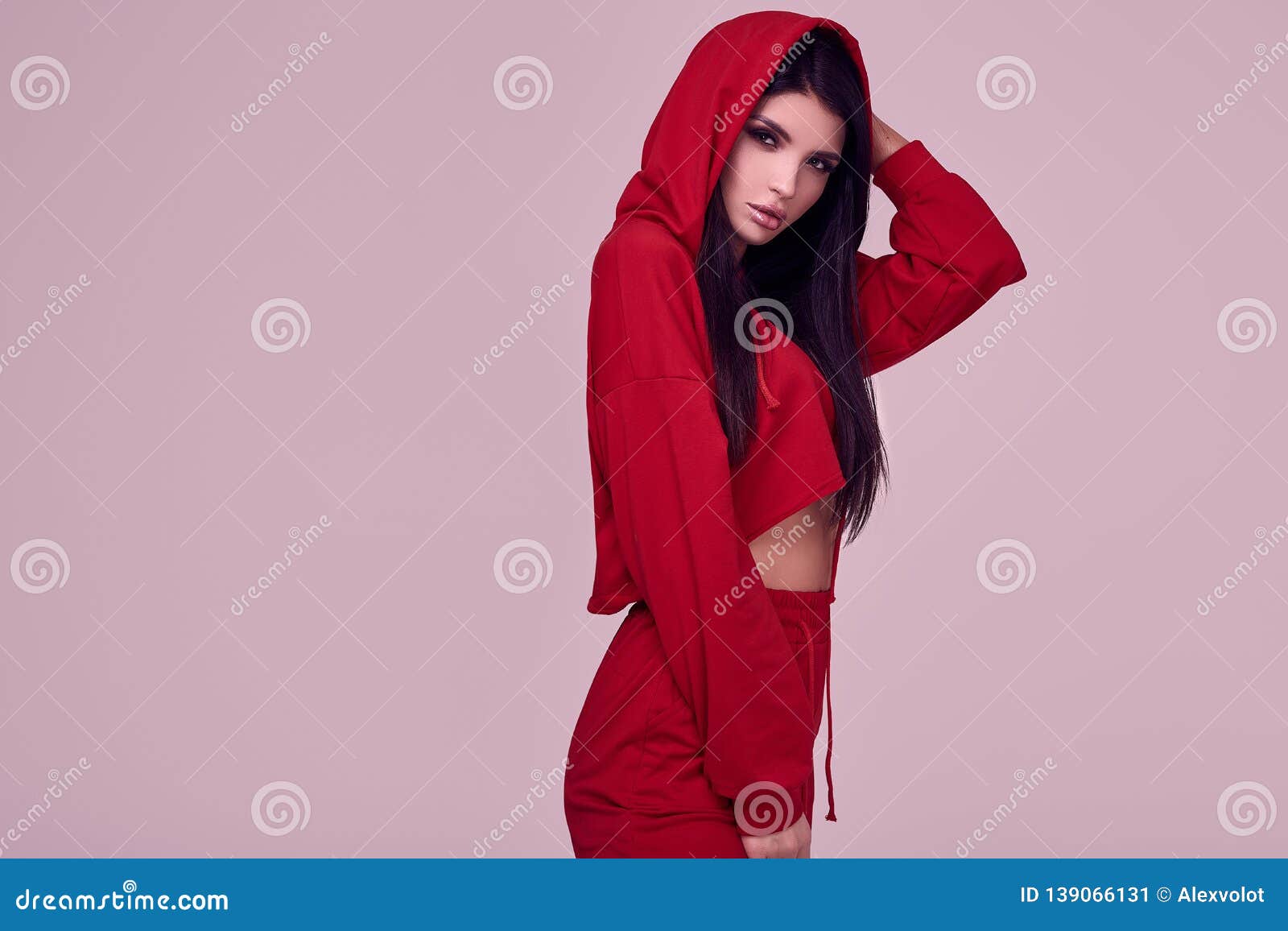 Gorgeous Brunette Woman in Fashion Red Hoodie in Studio Stock Image ...