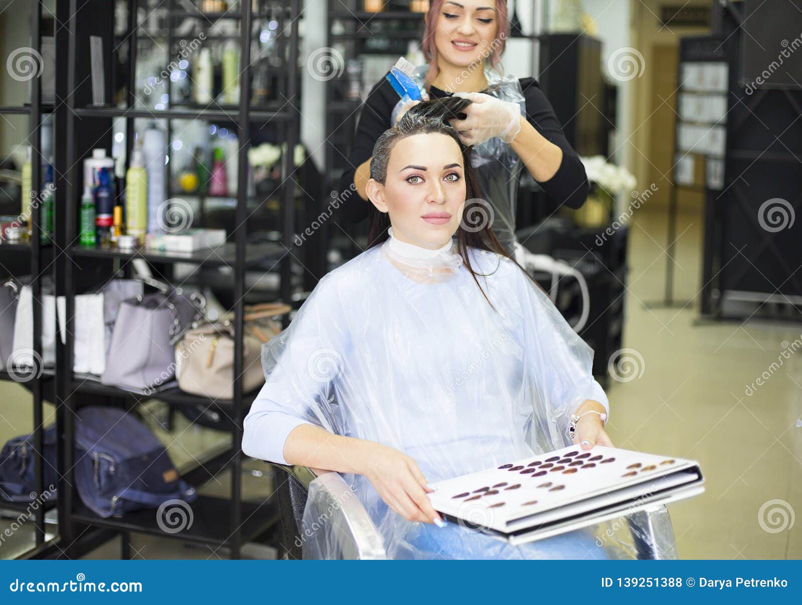 Gorgeous Happy Woman Looking To the Camera while Examining Hair Dye Color Chart with Her Hairdresser at the Beauty Salon Treatment Stock Photo - Image of profession, chart: 139251388 Gorgeous Happy Woman Looking To the Camera while Examining Hair Dye Color Chart with Her Hairdresser at the Beauty Salon Treatment Stock Photo - Image of profession, chart: 139251388