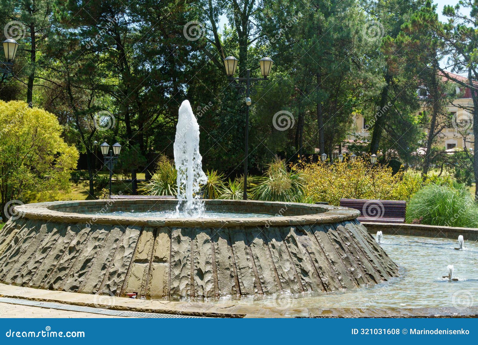 gorgeous set of fountains next to the festivalny concert hall. fountains in a landscaped city park along kurortny prospekt in