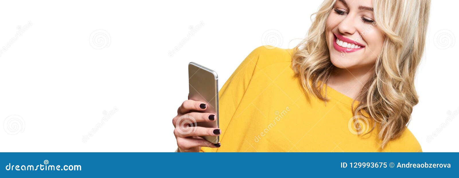 gorgeous smiling woman looking at her mobile phone. woman texting on her phone,  over white background.
