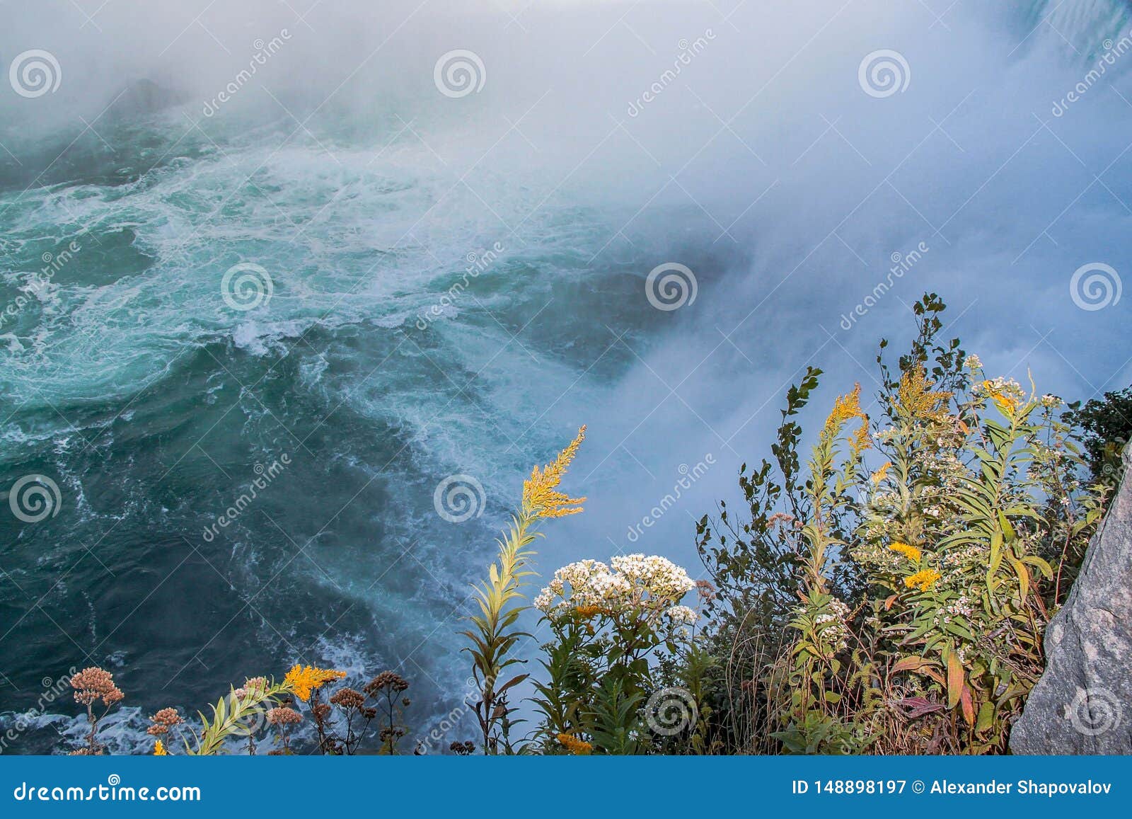 gorgeous view of niagara falls landscape.waves rumbling against the rocky shore.