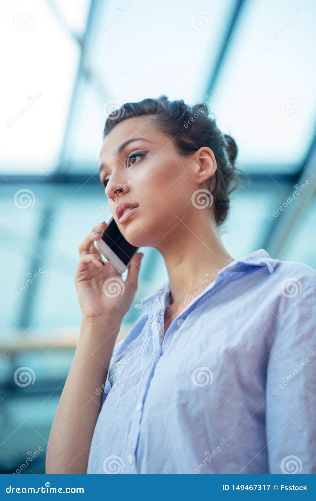 Gorgeous Woman Talking on Mobile Phone at Airport Stock Image - Image ...