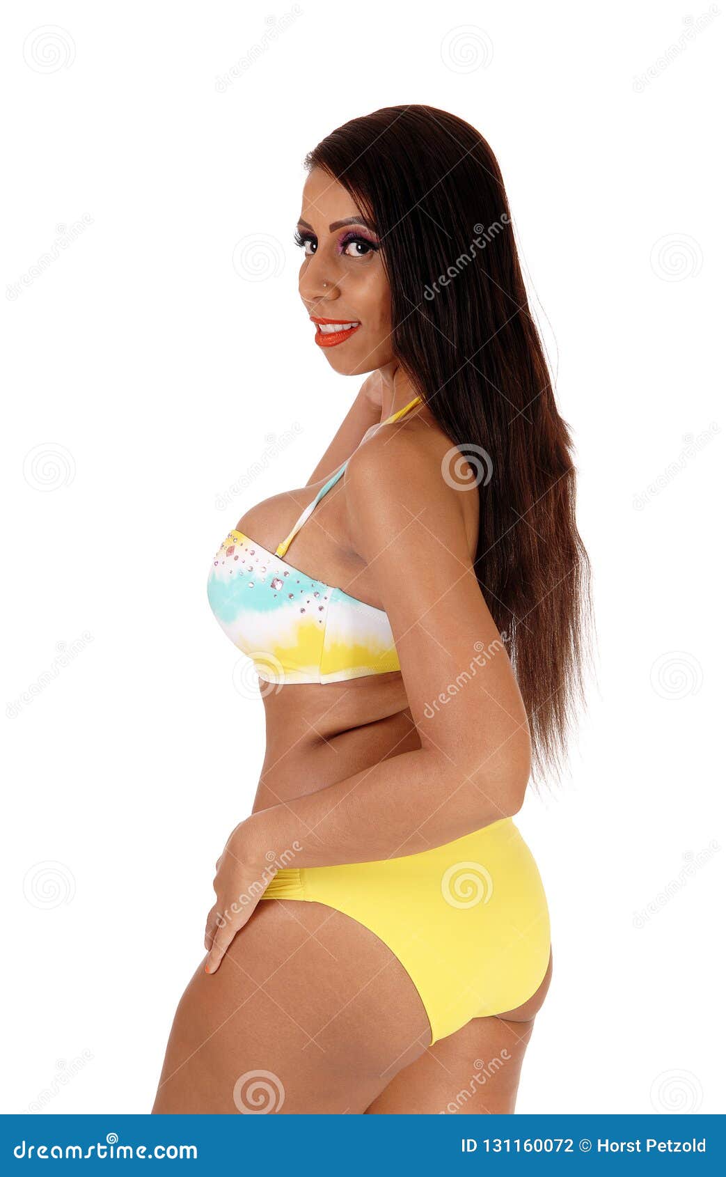 Beautiful Woman Standing in a Bikini in Profile Stock Photo