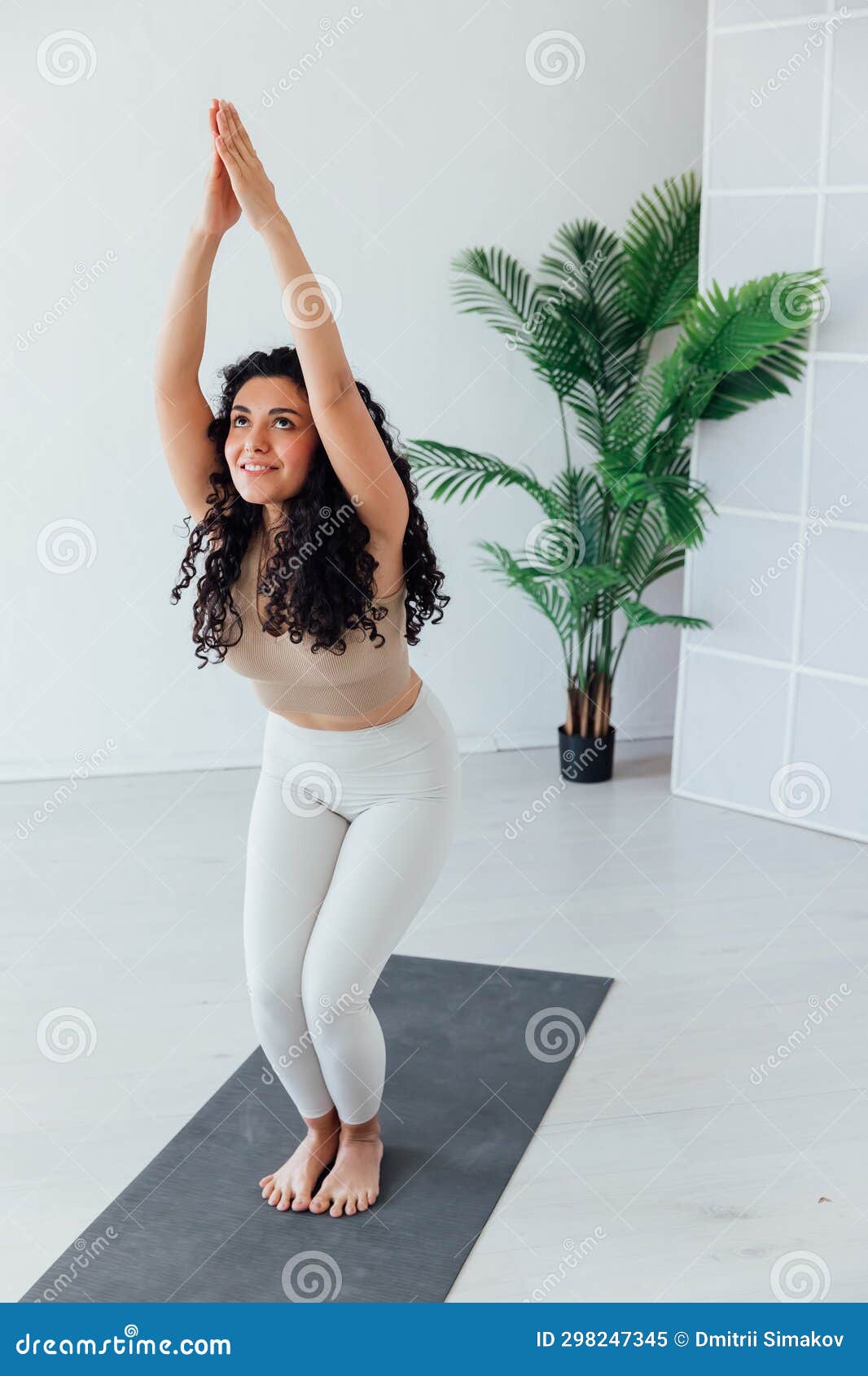 Gorgeous Young Woman Practicing Yoga Indoor. Beautiful Girl Practice  Adkho-mukkha-shvanasana in a Training Hall Imagem de Stock - Imagem de  fino, lifestyle: 298247345