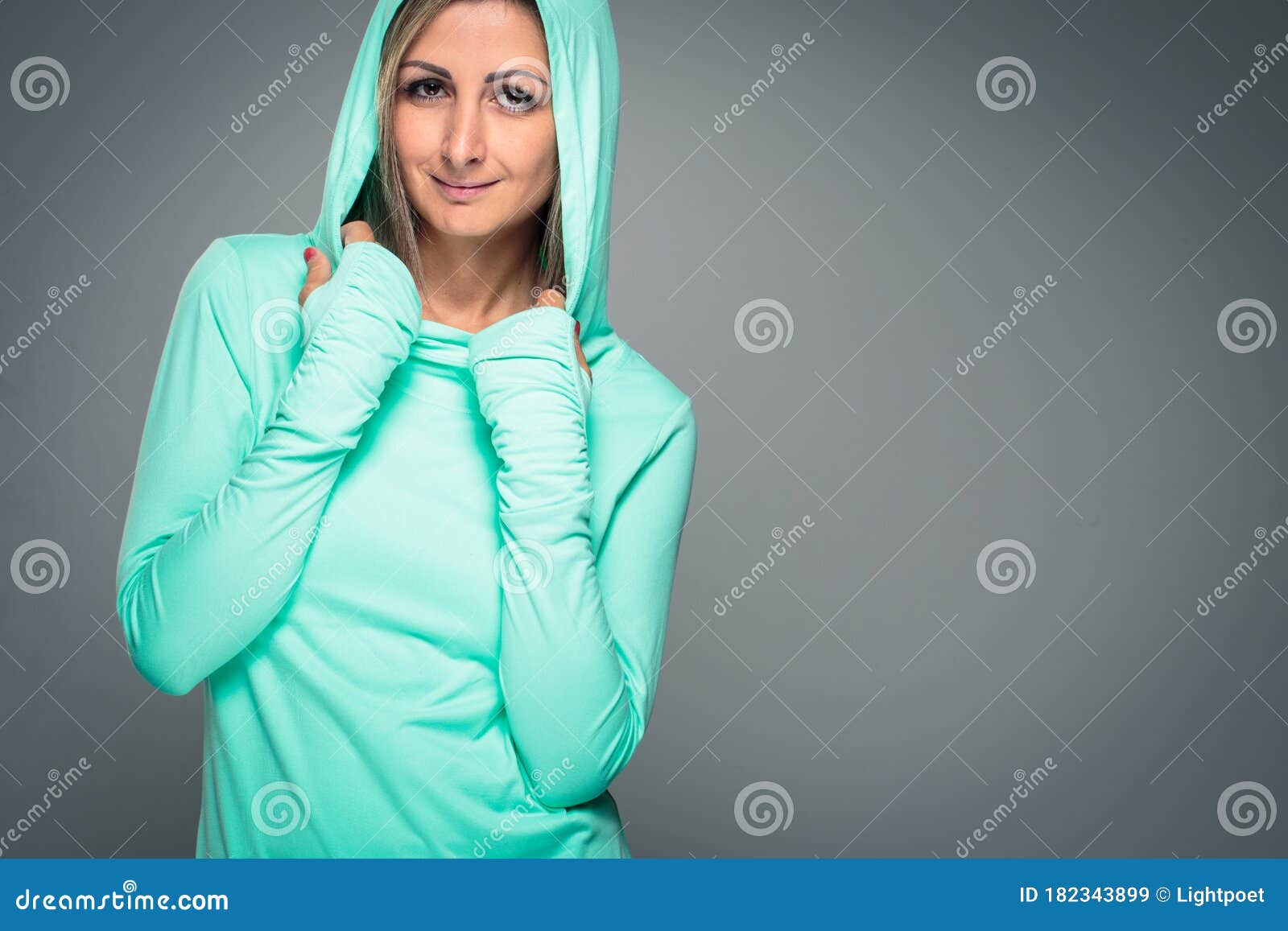 Gorgeous Young Woman Smiling, Looking Happy in Her Favorite Hoodie ...