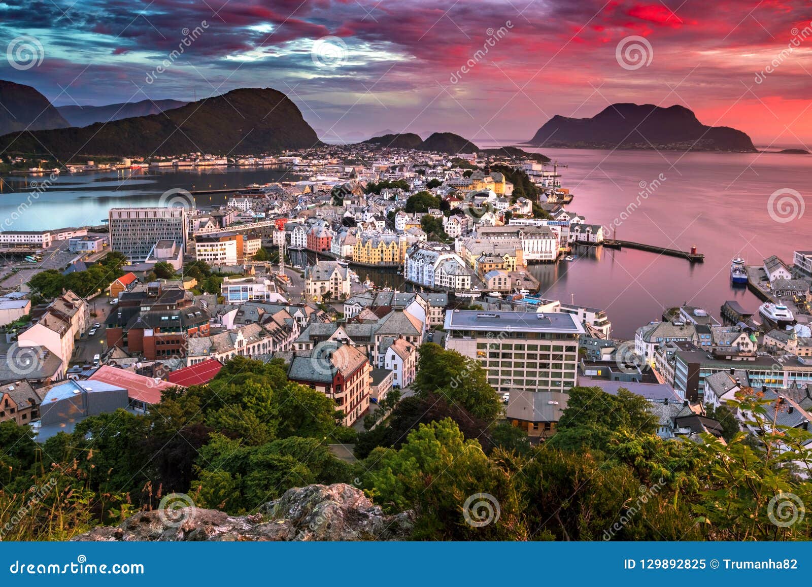 City Scene with Aerial View of Alesund Center at Gorgeous Sunset. Image of a perfect sunset in Alesund, the most beautiful town in the western coast of Norway, taken from Mount Aksla Viewpoint.