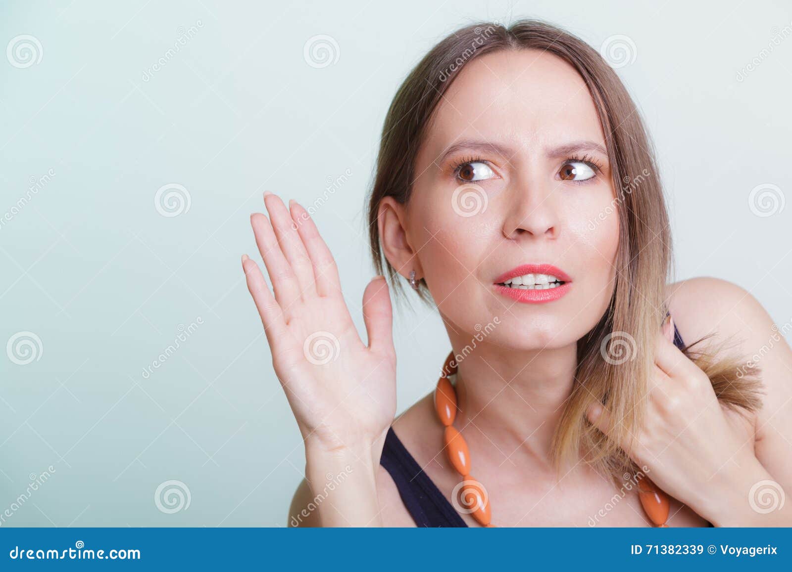 Gossip Girl Eavesdropping With Hand To Ear Stock Image Image Of