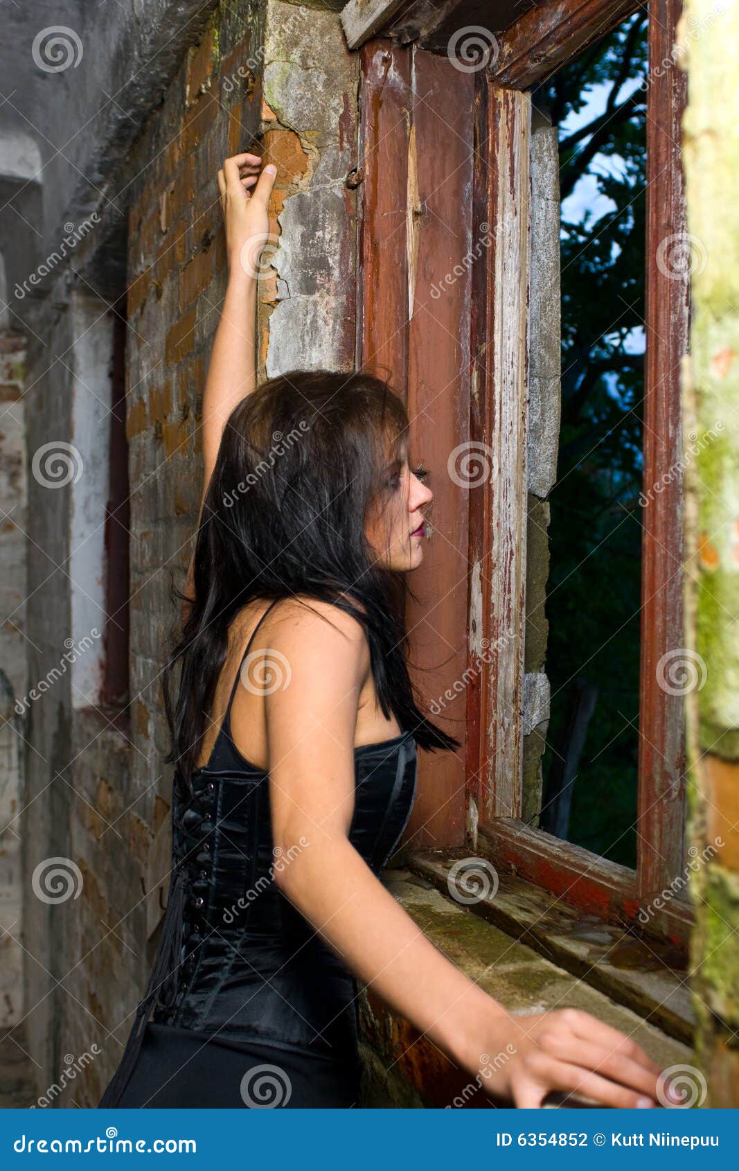 Goth Girl Looking Out Window Stock Photography - Image 