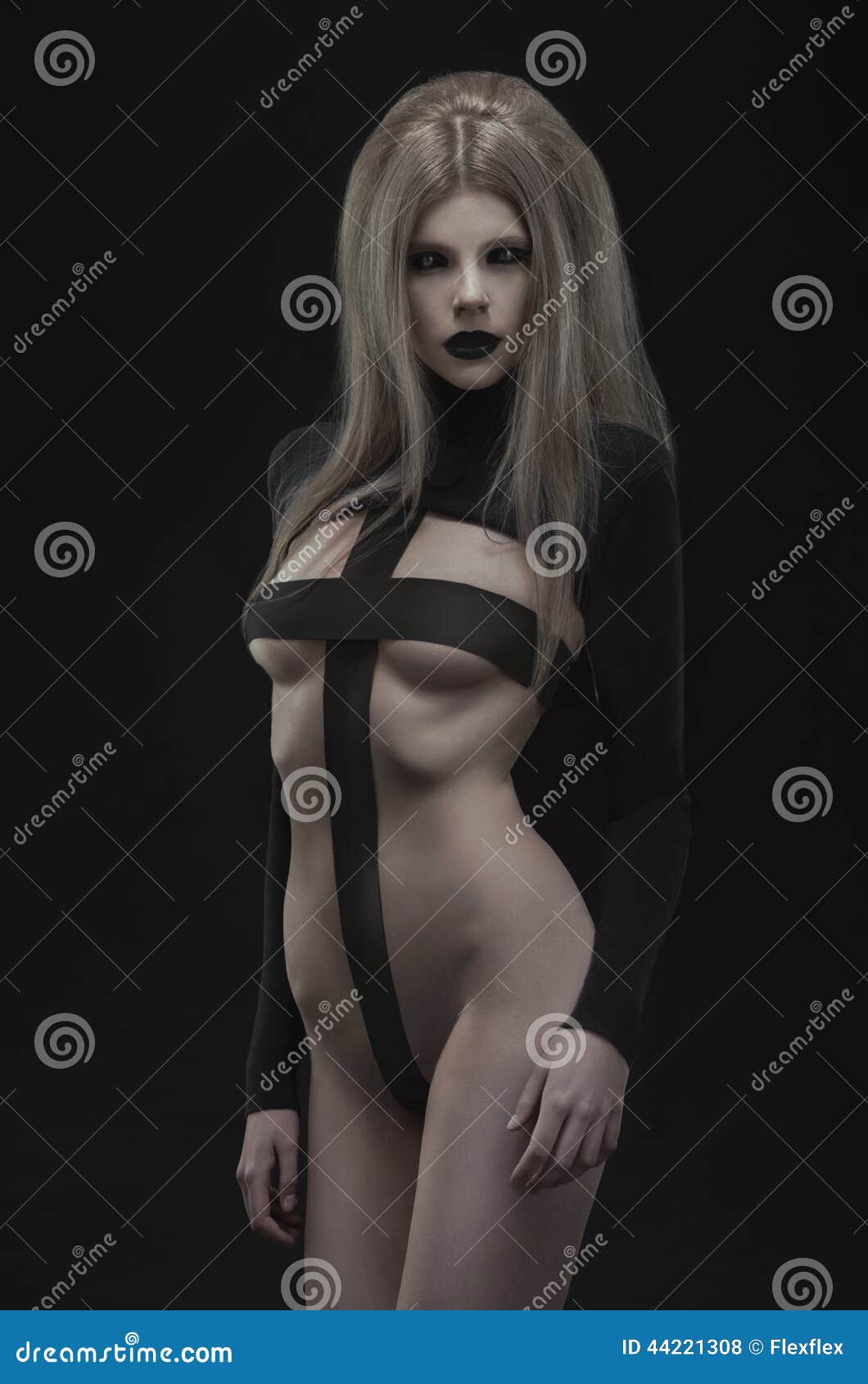 gothic woman in creative black outfit