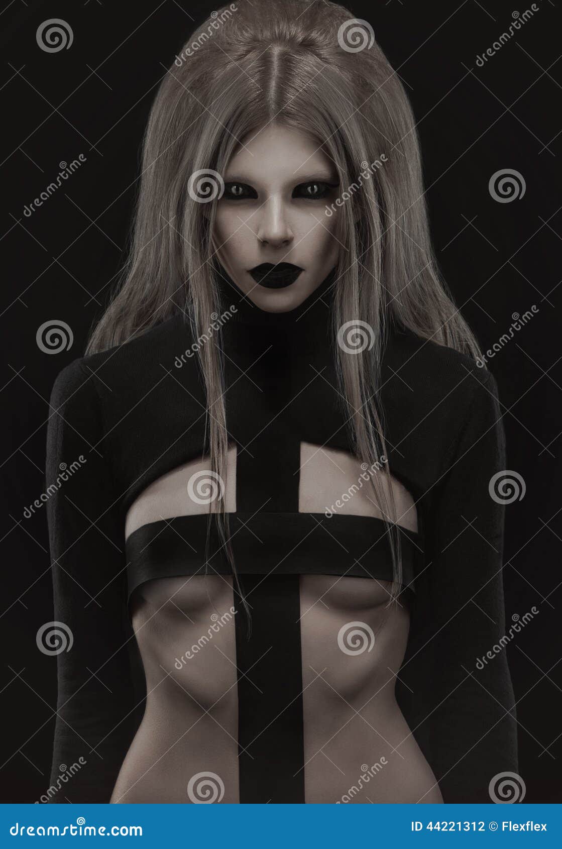 gothic woman in creative black outfit