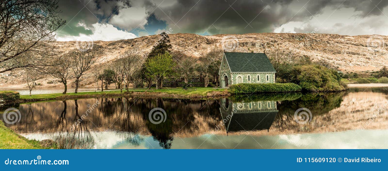 View of the Gouganebarra Lake and the river Lee outside of Saint Finbarr`s Oratory chapel in county Cork, Ireland.