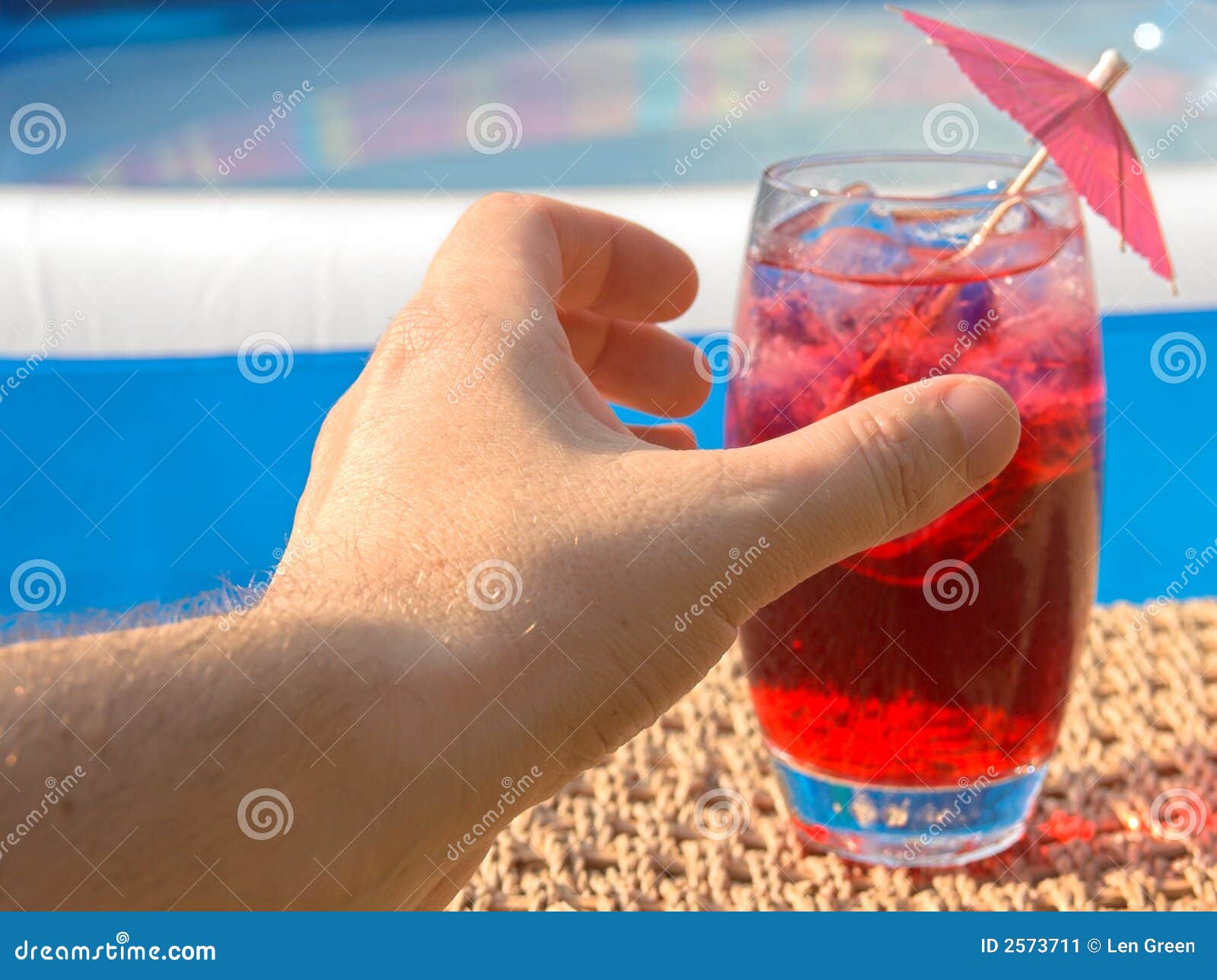 Grab that drink. Fruit drink with ice by the pool