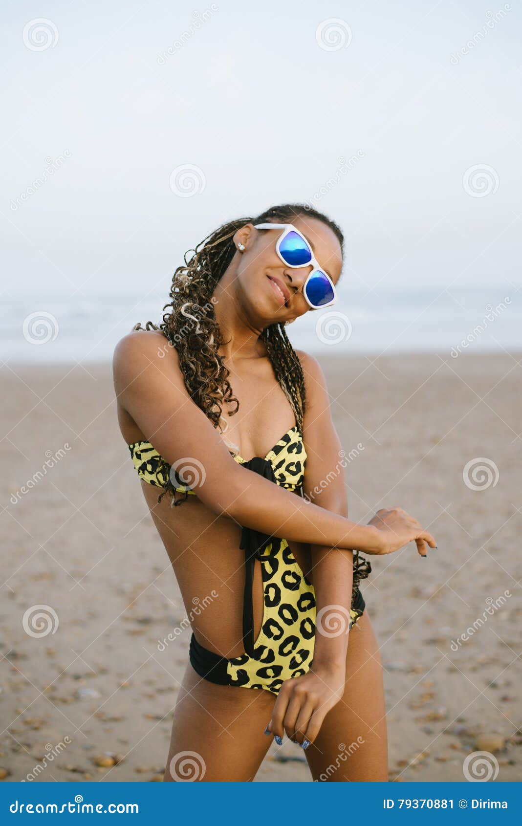 Graceful Brazilian Woman in Fashion Bikini at the Beach Stock