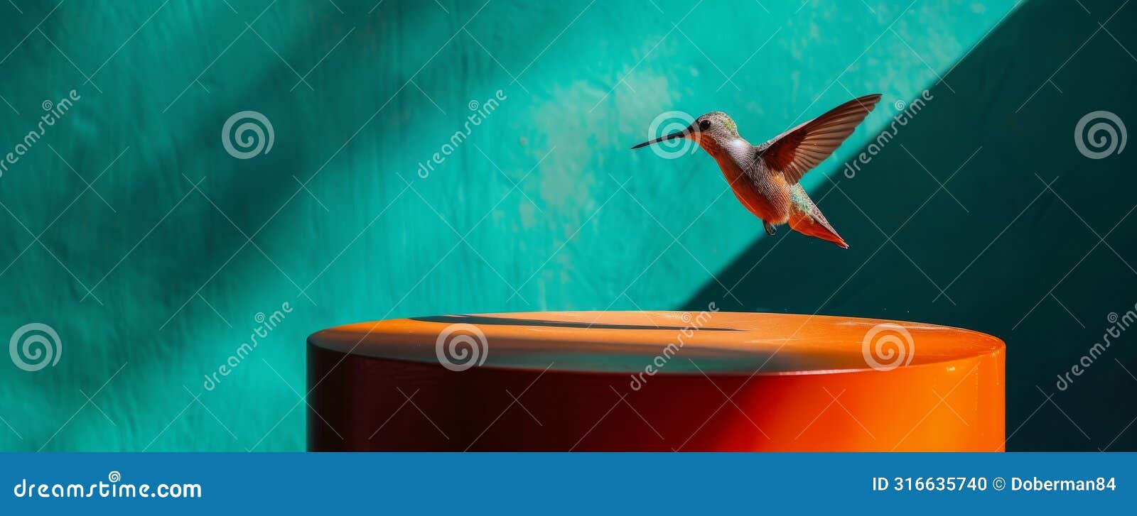 a graceful hummingbird in motion, hovering above an orange top hat against a turquoise background in a minimalist