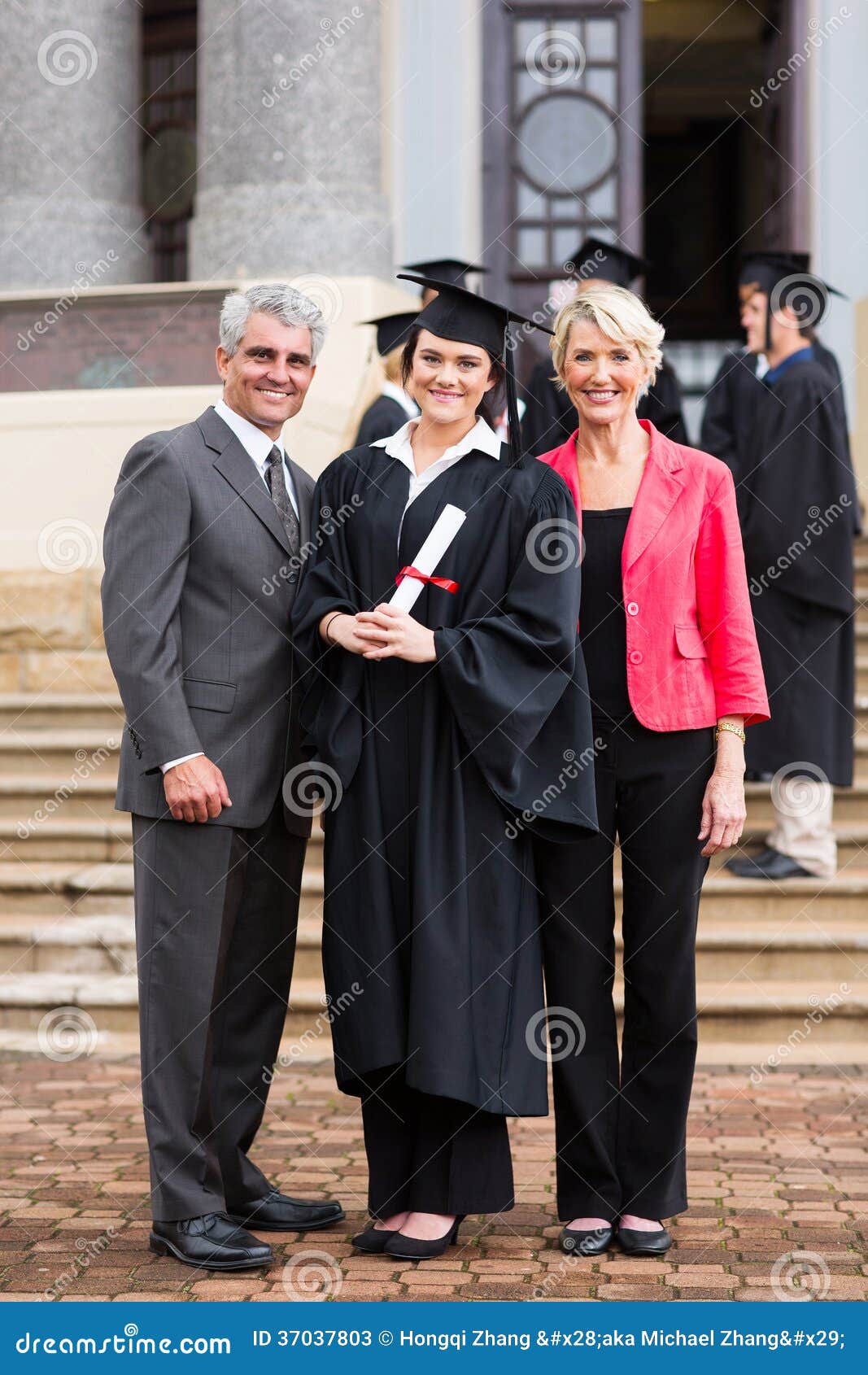 Graduate with parents stock image. Image of education 37037803