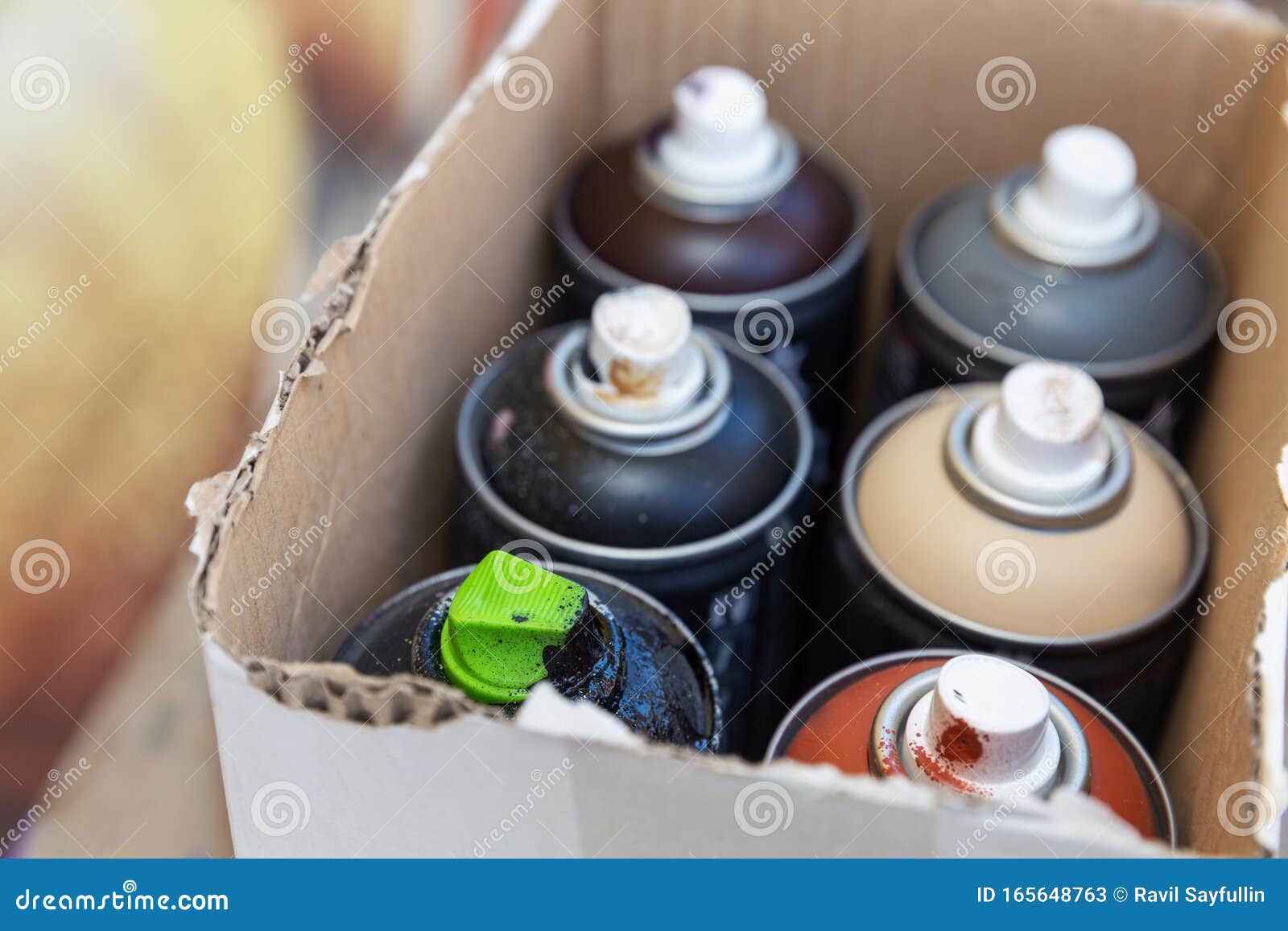 Graffiti Spray Dispenser in Different Colors in a Box Stock Image