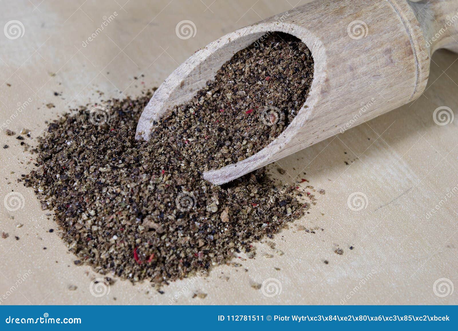 A Grain of Pepper on a Kitchen Table. Ground Pepper in a Kitchen Stock
