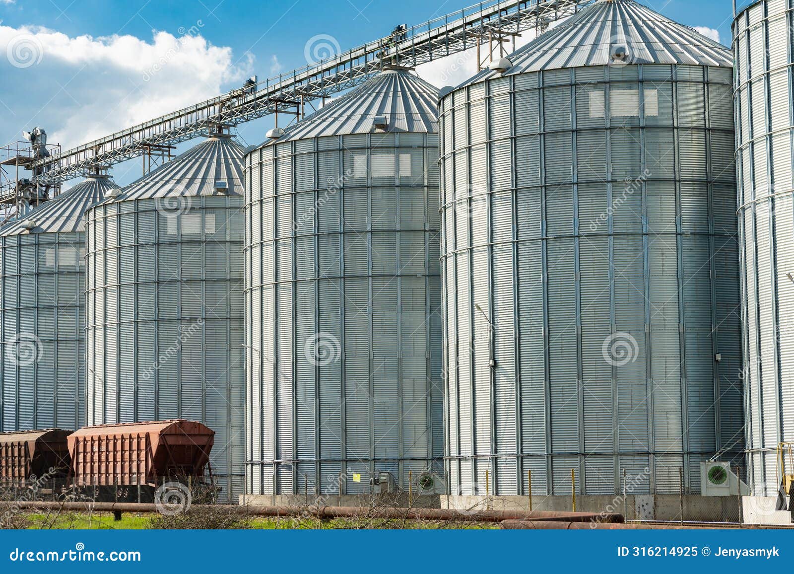 grain storage. modern steel agricultural grain granary silos. agribusiness.