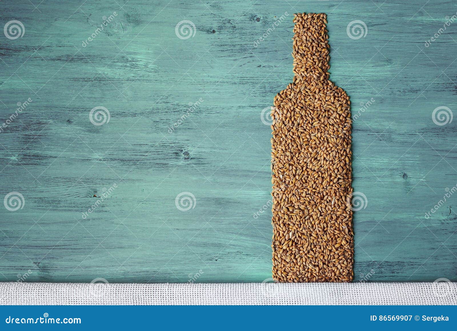 Grains and alcohol bottle stock image. Image of pint 86569907