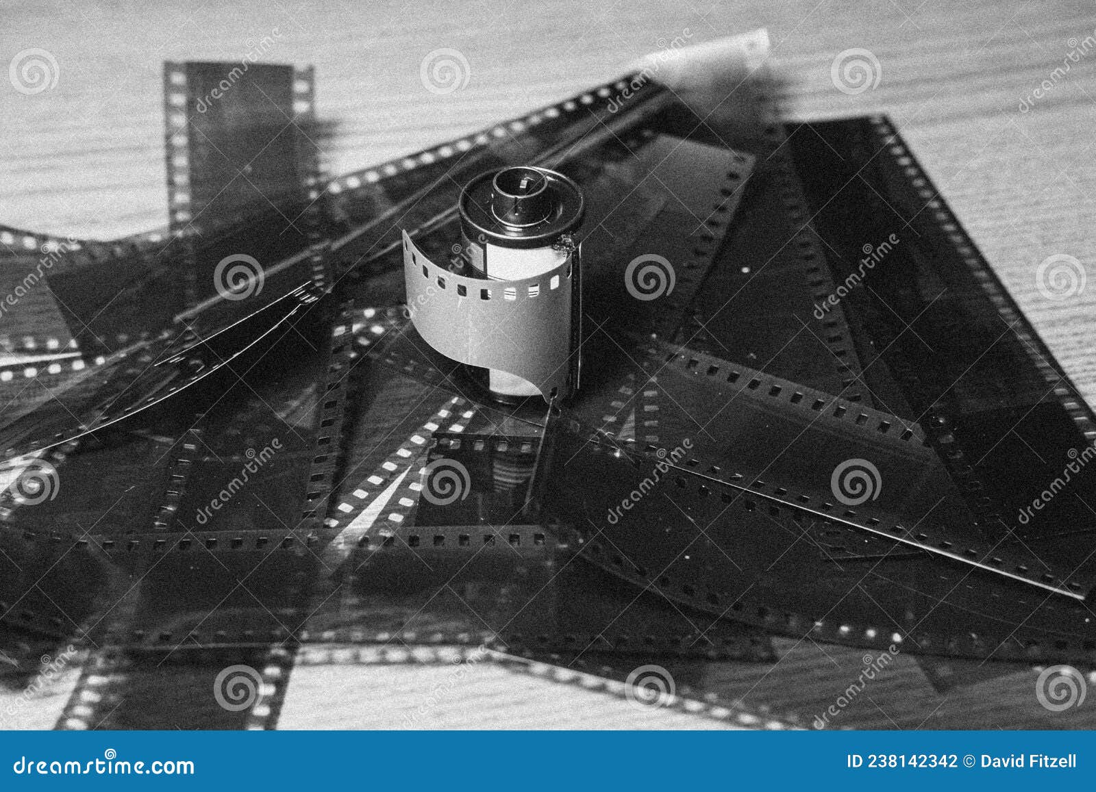 Grainy Image of a Roll of Film on Film Negatives Stock Photo Image of