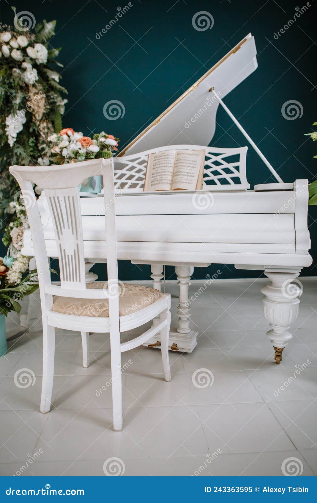 Grand Piano, Flowers in Studio. Piano Surrounded by Flowers Stock Image