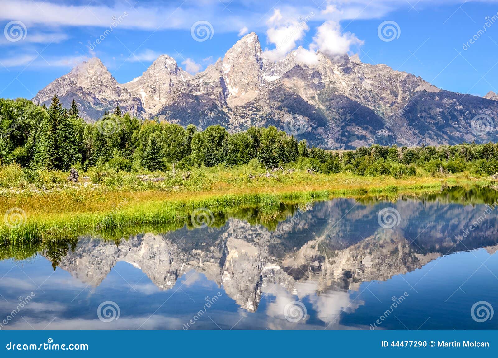 grand teton mountains landscape view with water reflection, usa