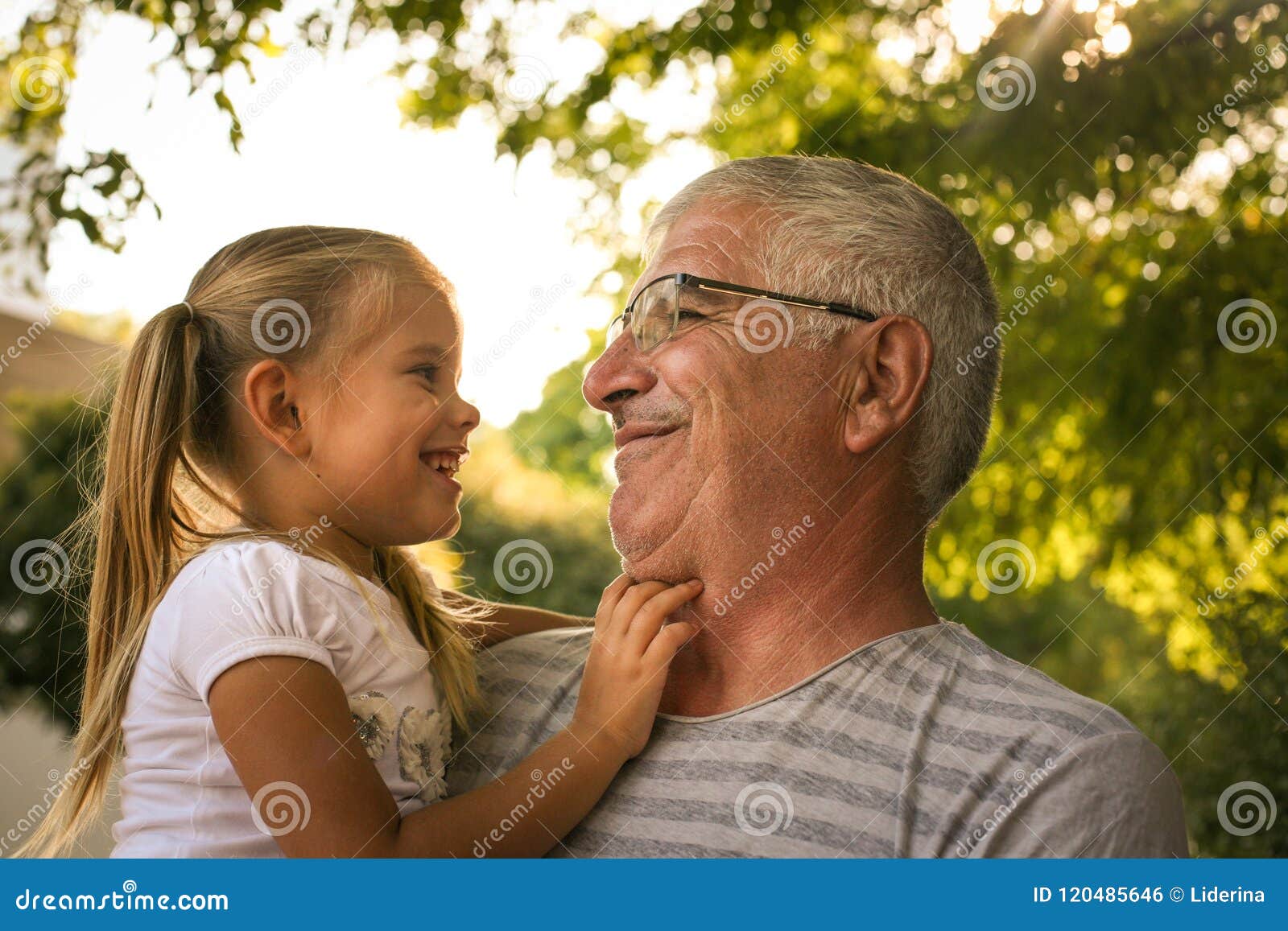 Granddaughter Enjoy Un  Grandpas Hug  Stock Photo Image 